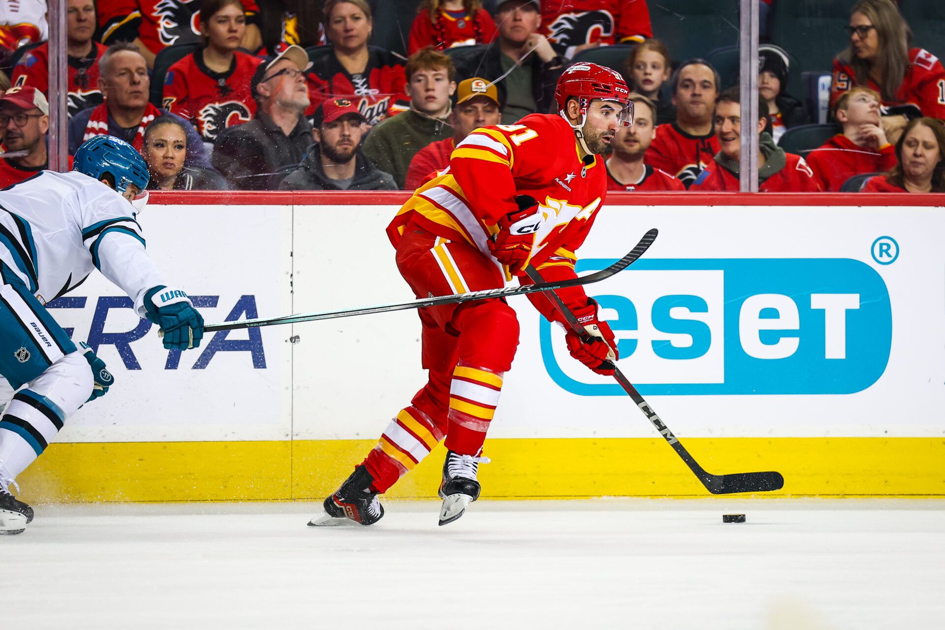 Calgary Flames center Nazem Kadri (91) skates with the puck against the San Jose Sharks during the second period at Scotiabank Saddledome.