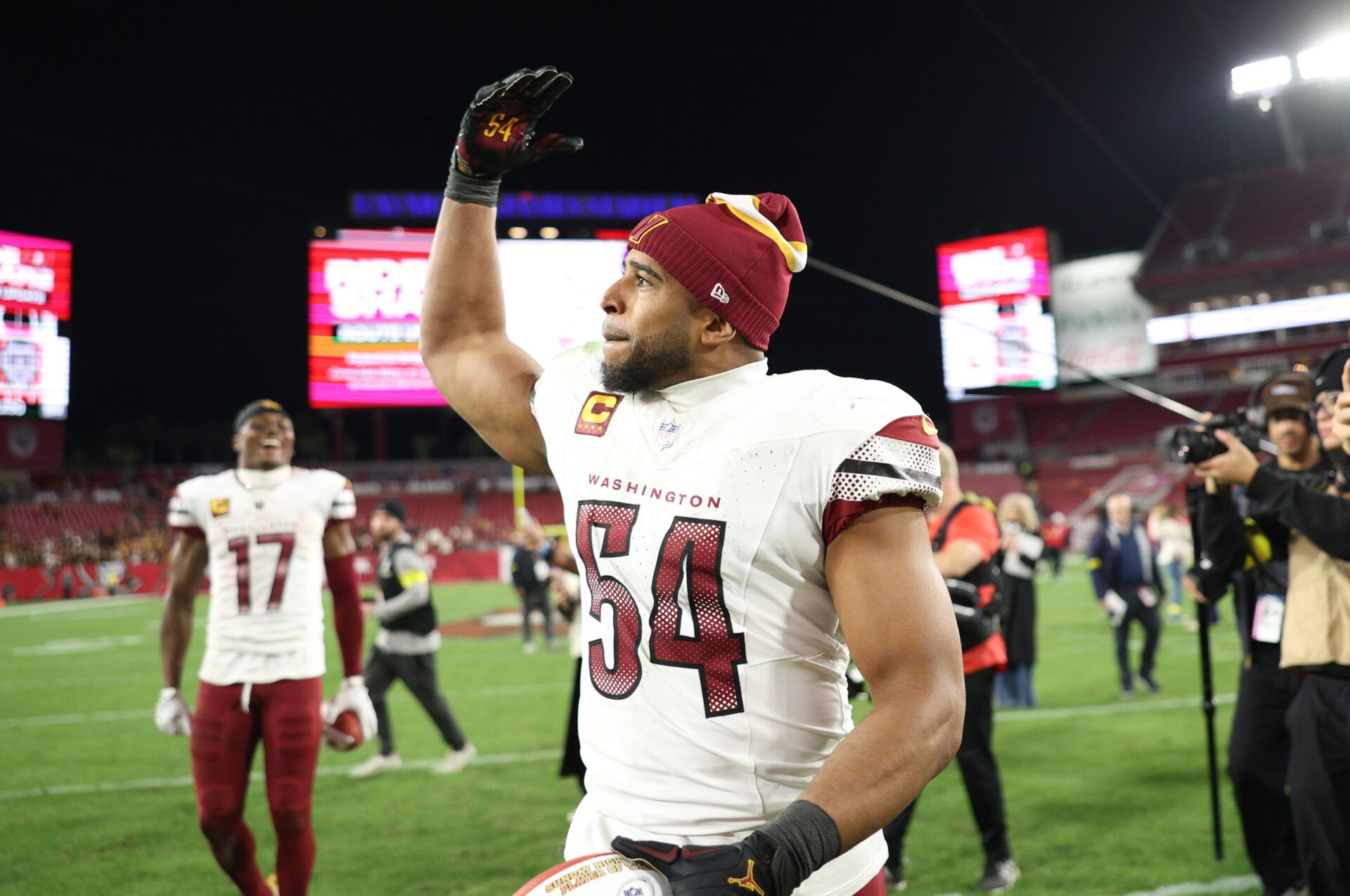 Washington Commanders linebacker Bobby Wagner (54) celebrates after winning a NFC wild card playoff against the Tampa Bay Buccaneers at Raymond James Stadium.
