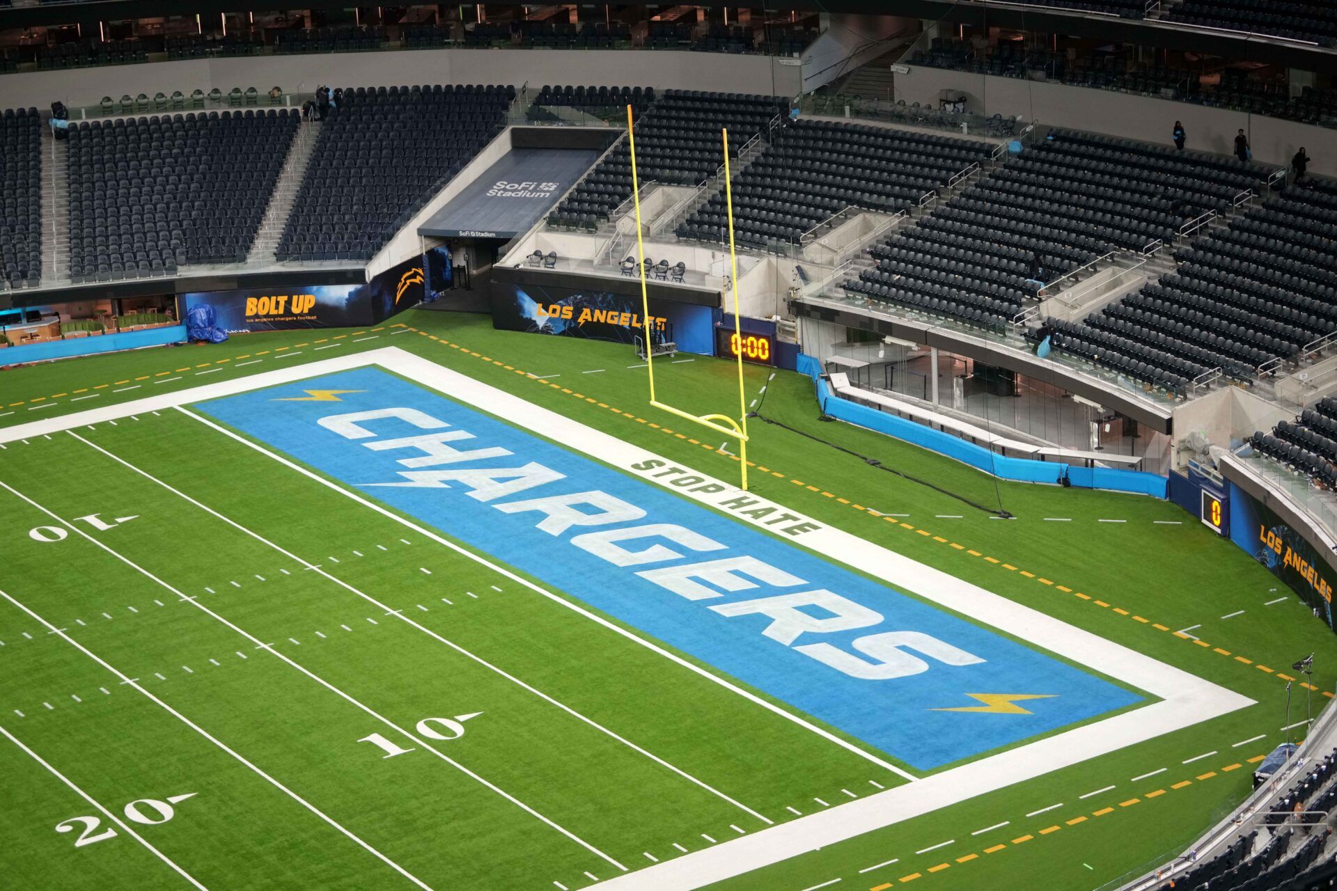 The Los Angeles Chargers logo in the end zone at SoFi Stadium.