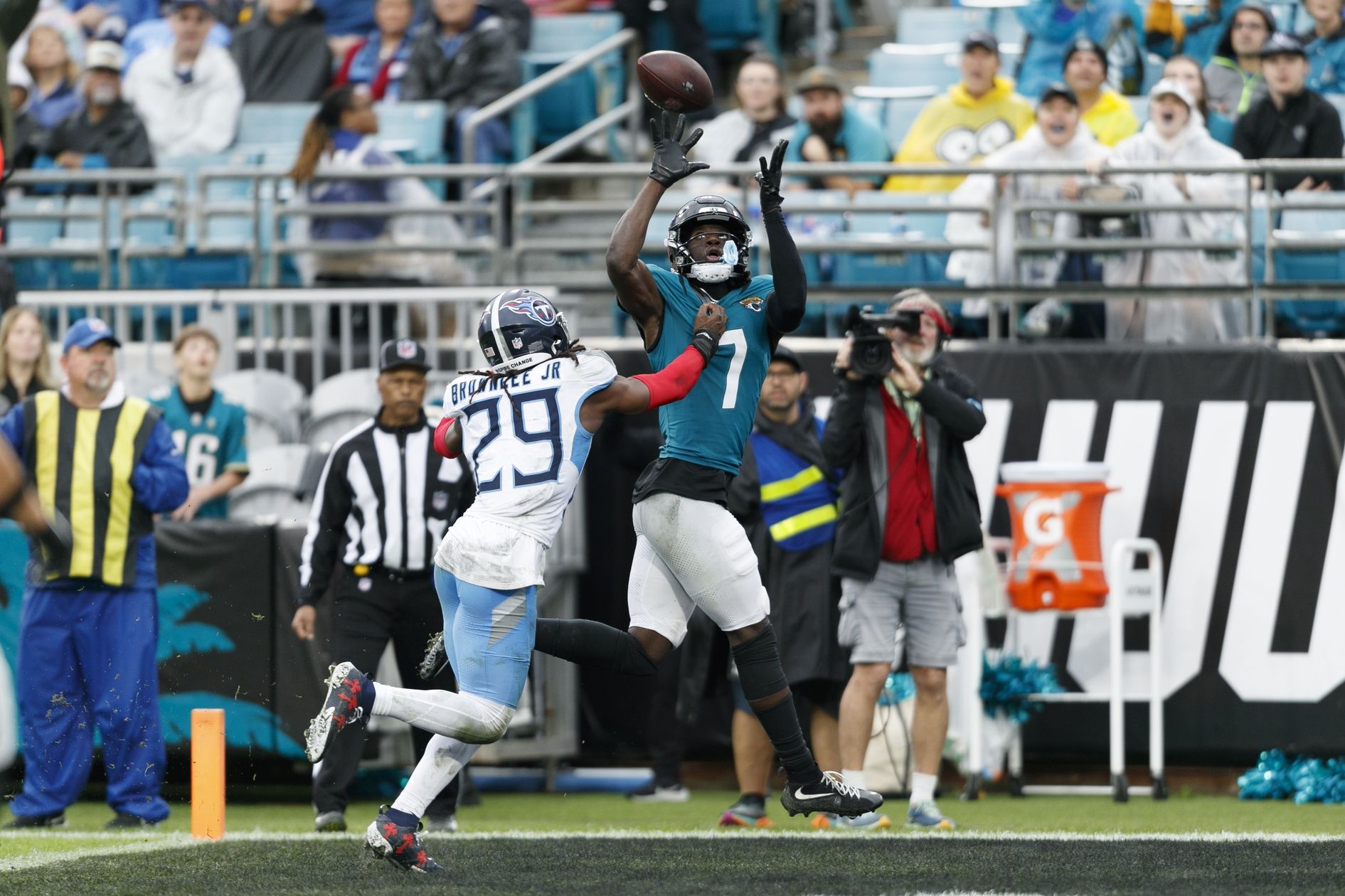 Jacksonville Jaguars wide receiver Brian Thomas Jr. (7) scores a touchdown against Tennessee Titans cornerback Jarvis Brownlee Jr. (29) during the fourth quarter at EverBank Stadium.