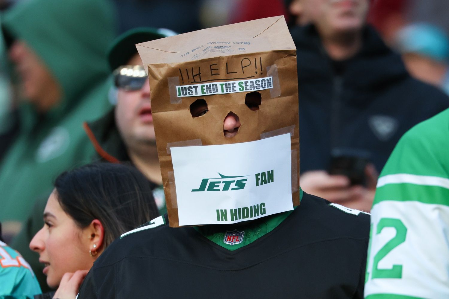 A New York Jets fan looks on during the first quarter of the game between the New York Jets and the Miami Dolphins at MetLife Stadium.