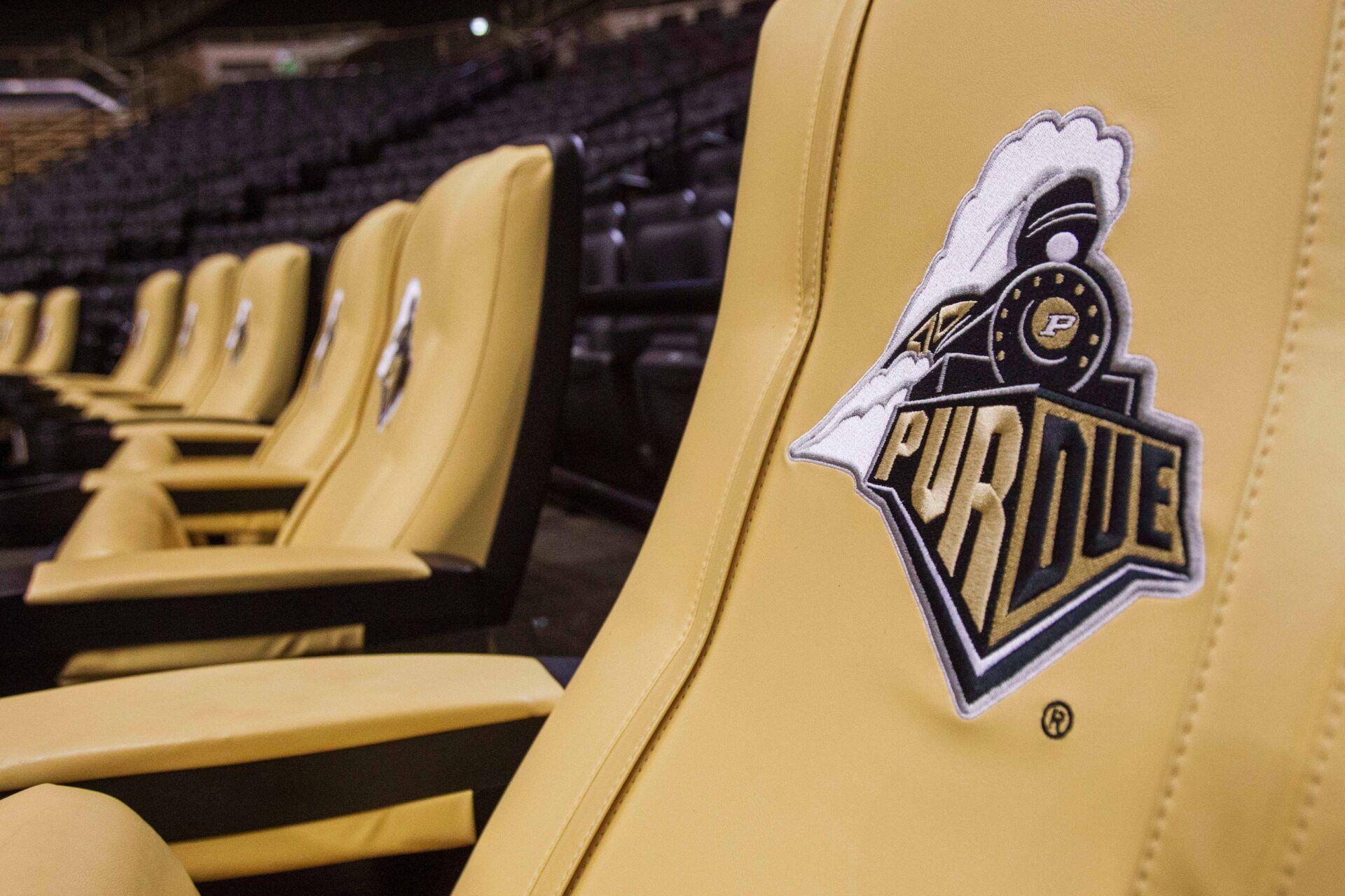 A detailed view of the Purdue Boilermaker logo on a chair at Mackey Arena.