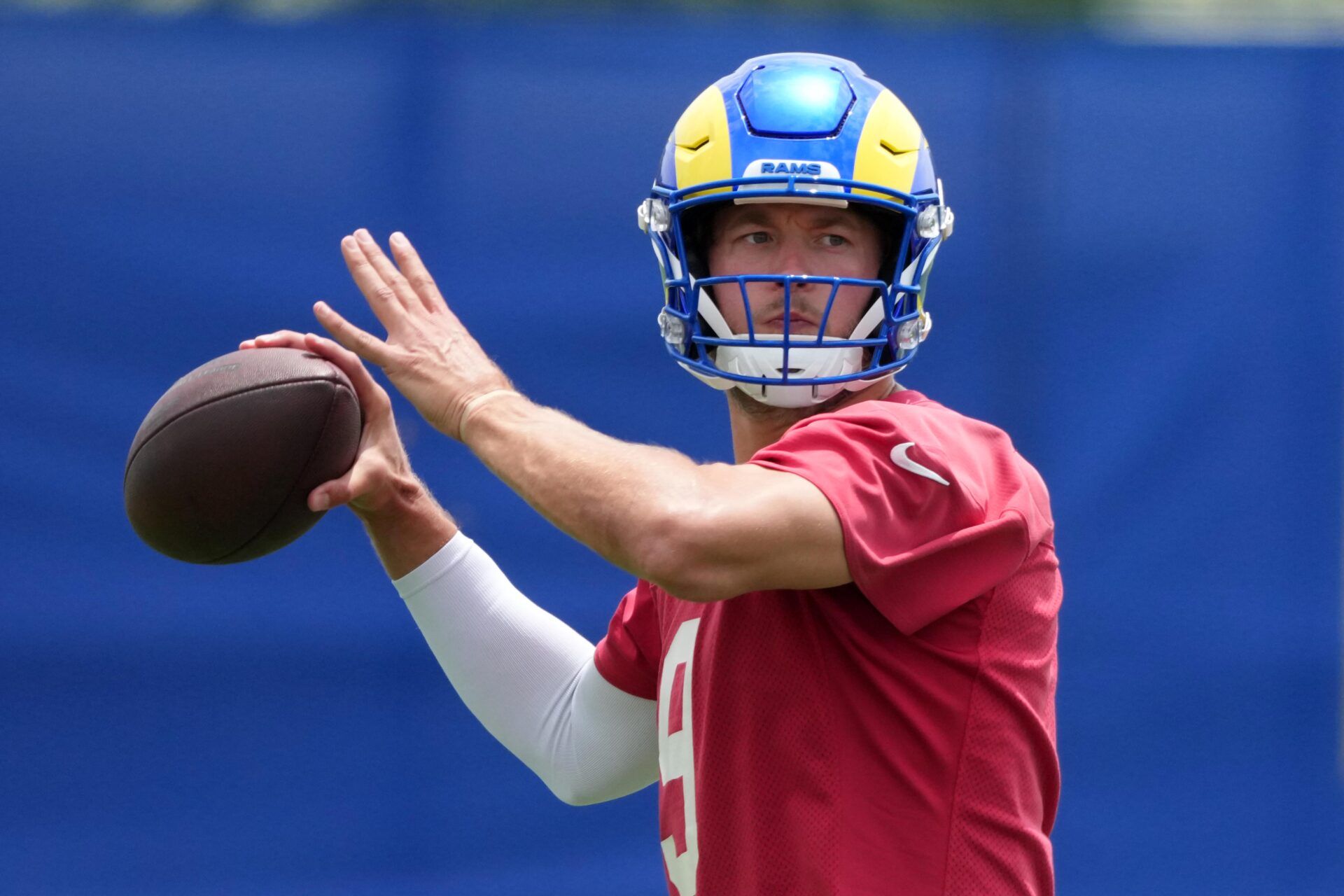 Los Angeles Rams quarterback Matthew Stafford (9) throws the ball during organized team activities at Rams Practice Facility.