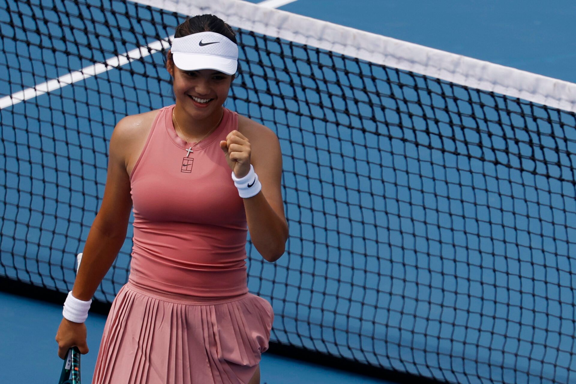 Emma Raducanu (GBR) celebrates after match point against Naomi Osaka (JPN)(not pictured) in a women's singles match on day four of the Mubadala Citi DC Open at Rock Creek Park Tennis Center.