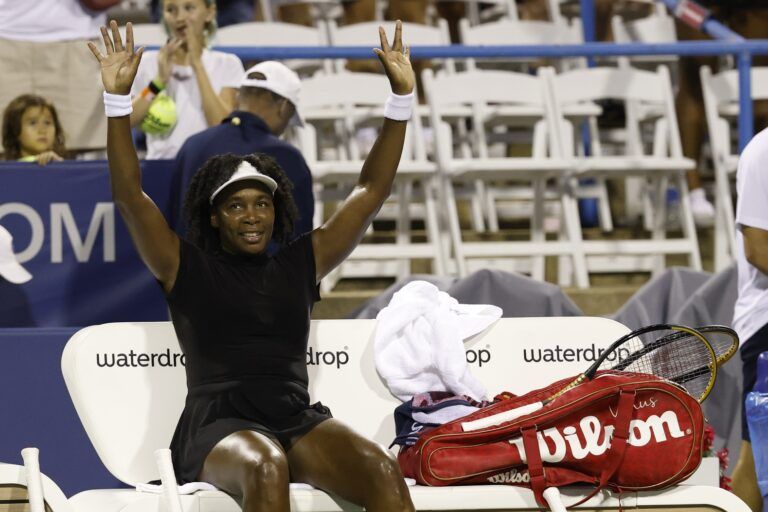 Venus Williams (USA) waves to the crowd after her match against Magdalena Frech (POL)(not pictured) in a women's singles match on day four of the Mubadala Citi DC Open at Rock Creek Park Tennis Center.
