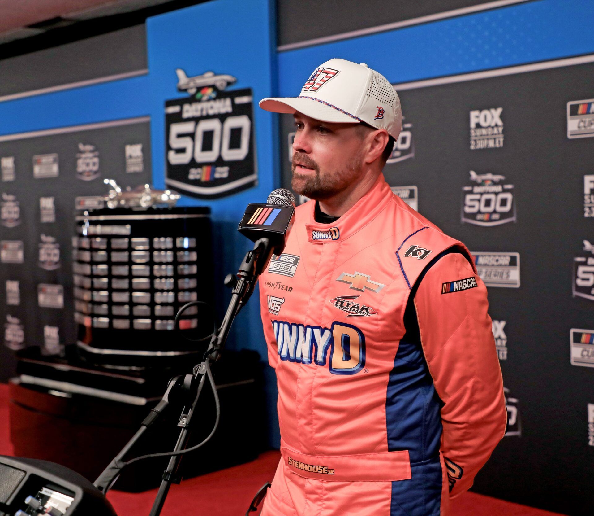 Ricky Stenhouse Jr. talks with the press on the red carpet during NASCAR media day on Wednesday, Feb.12, 2025.