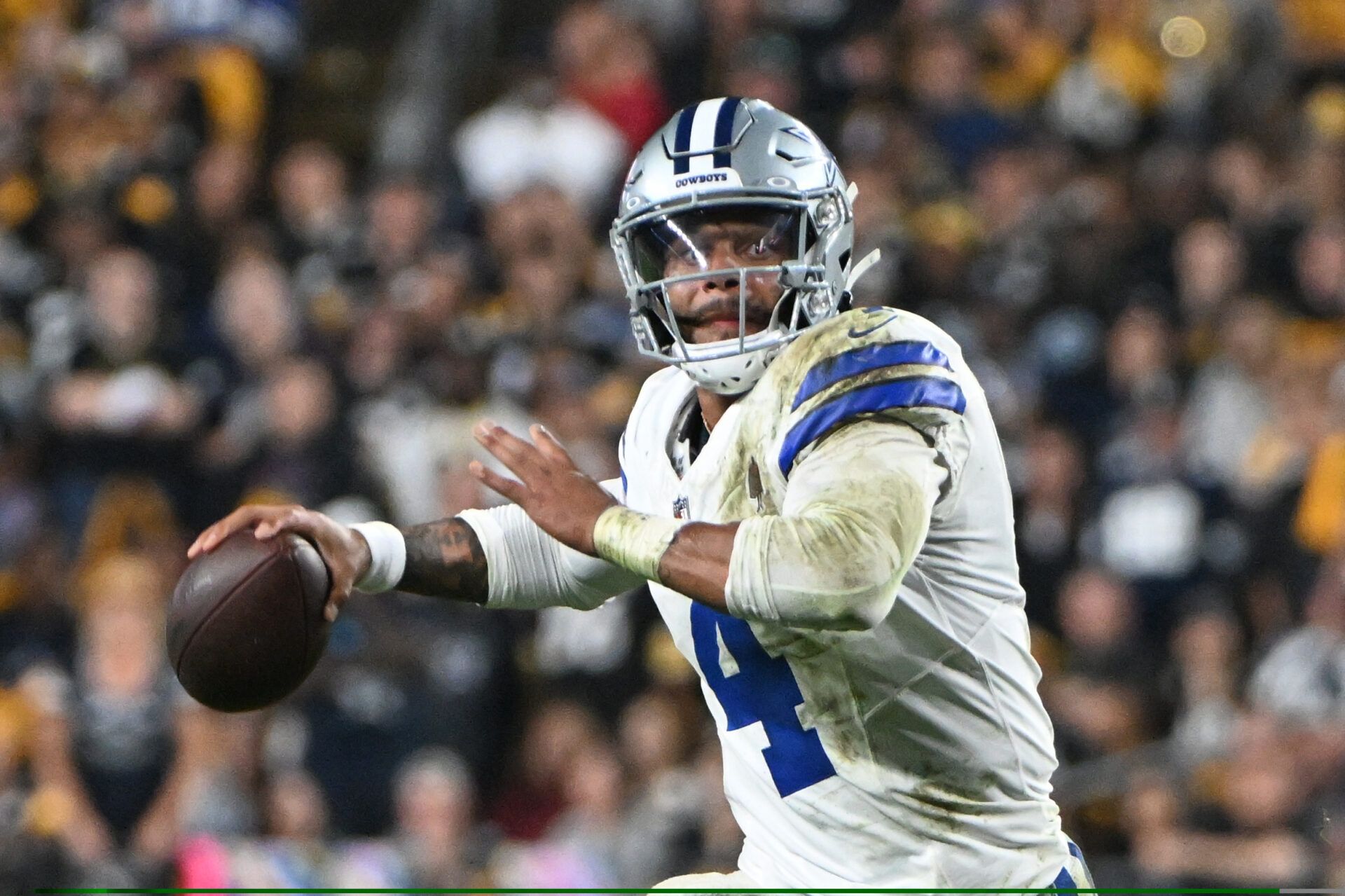 Dallas Cowboys quarterback Dak Prescott (4) looks to pass  against the Pittsburgh Steelers during the fourth quarter at Acrisure Stadium.