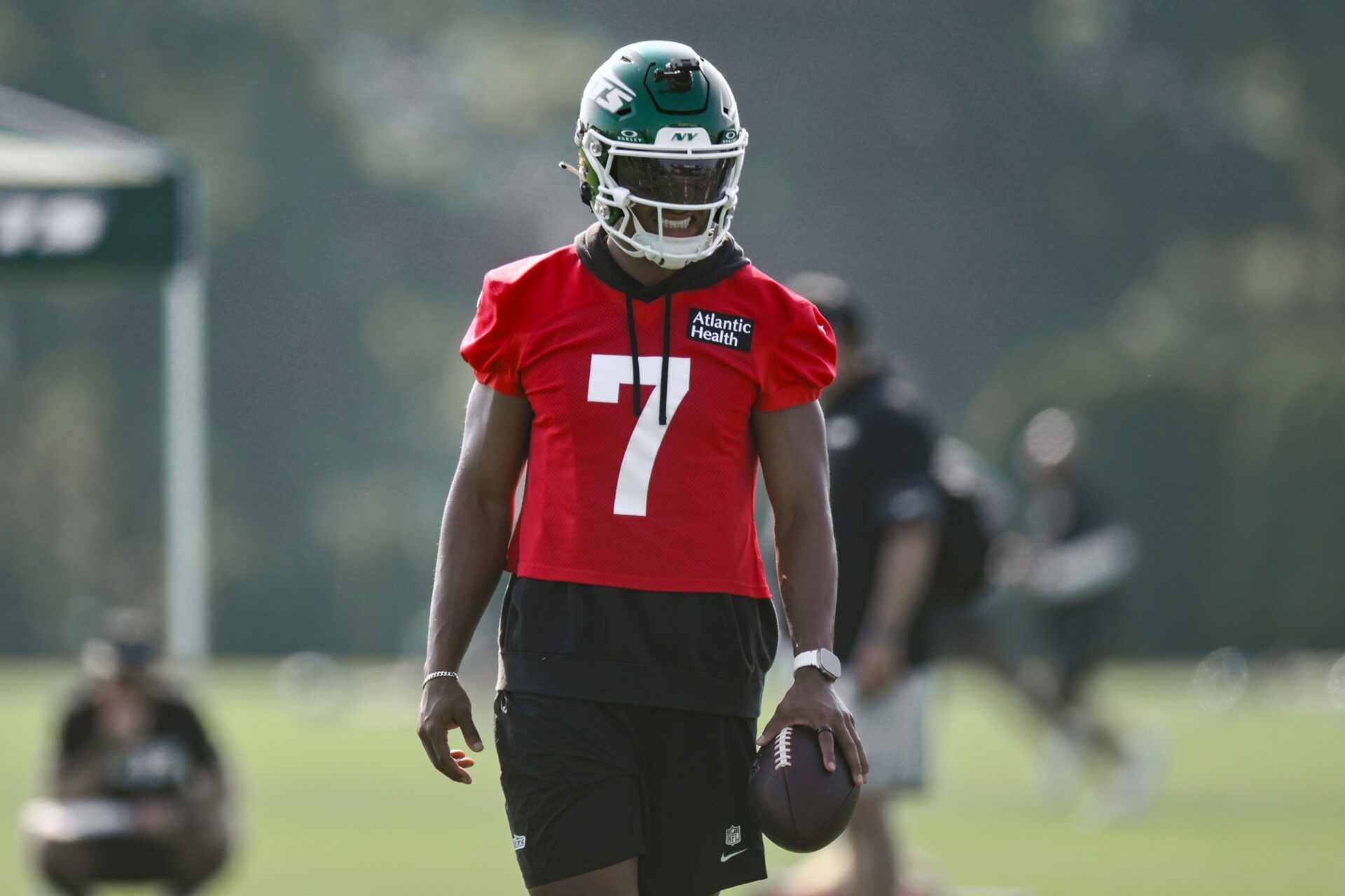 New York Jets quarterback Justin Fields (7) looks on during a drill at training camp at Atlantic Health Jets Training Center.