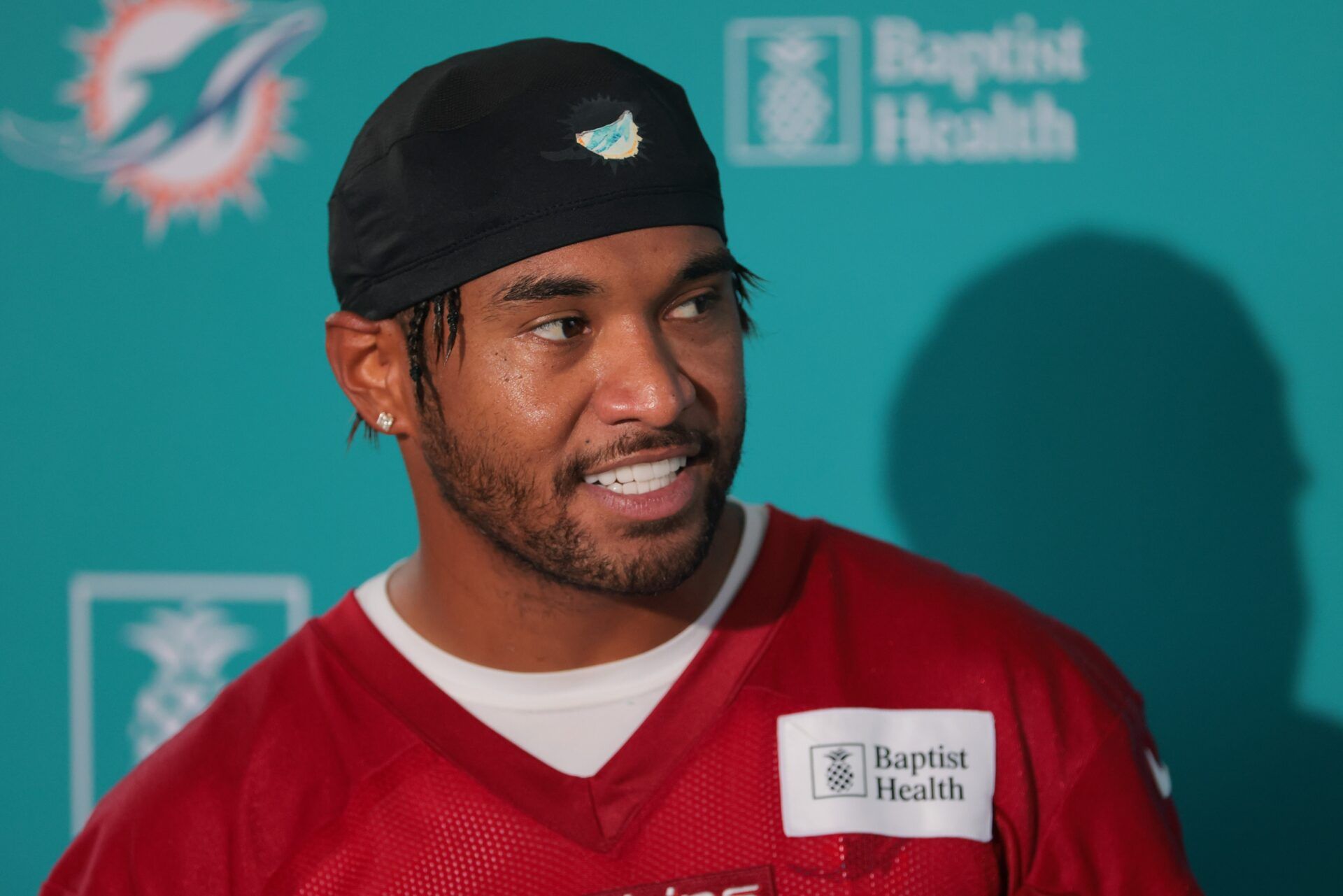 Miami Dolphins quarterback Tua Tagovailoa (1) speaks to reporters during training camp at Baptist Health Training Complex.