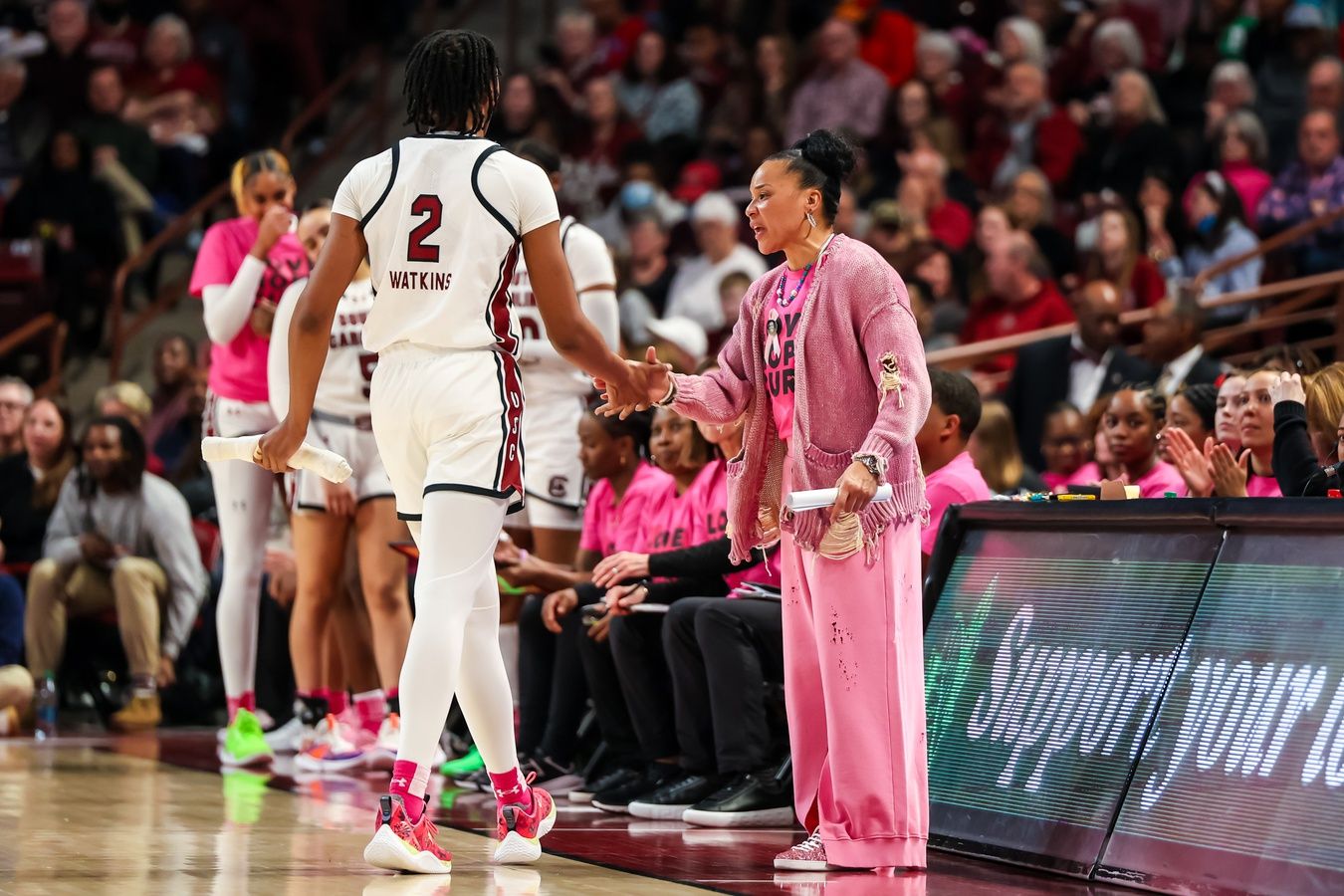 South Carolina Gamecocks head coach Dawn Staley greets forward Ashlyn Watkins (2) as she leaves the game against the Ole Miss Rebels in the second half at Colonial Life Arena.