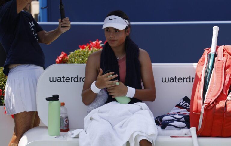 Emma Raducanu (GBR) sits in her player's chair during a changeover against Maria Sakkari (GRE)(not pictured) in a women's singles quarter-final of the Mubadala Citi DC Open at Rock Creek Park Tennis Center.