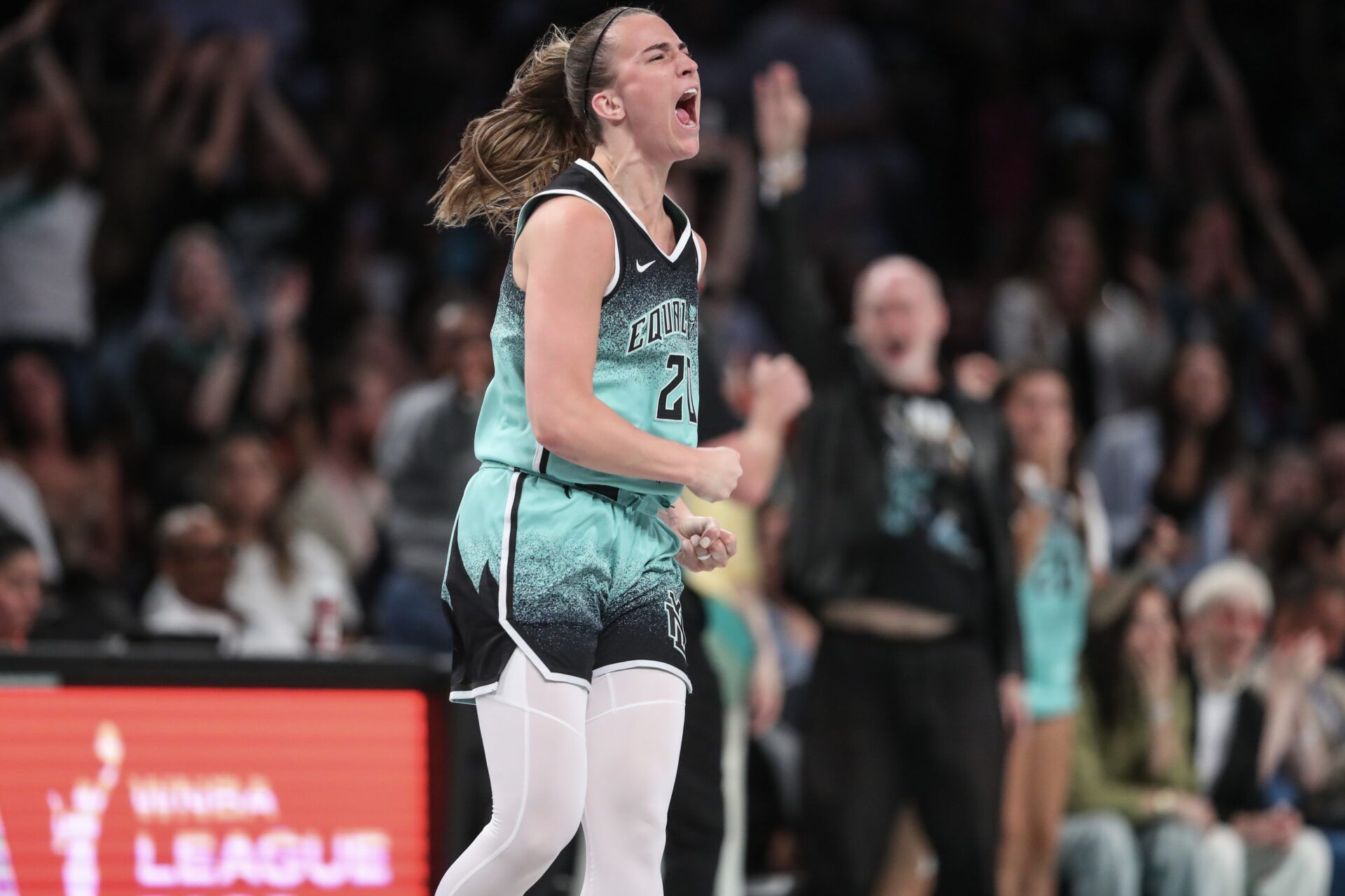New York Liberty guard Sabrina Ionescu (20) celebrates after scoring in the fourth quarter against the Indiana Fever at Barclays Center.