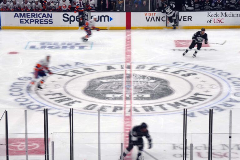 The  Los Angeles Fire Dept (LAFD) logo at center ice at the Crypto.com Arena.