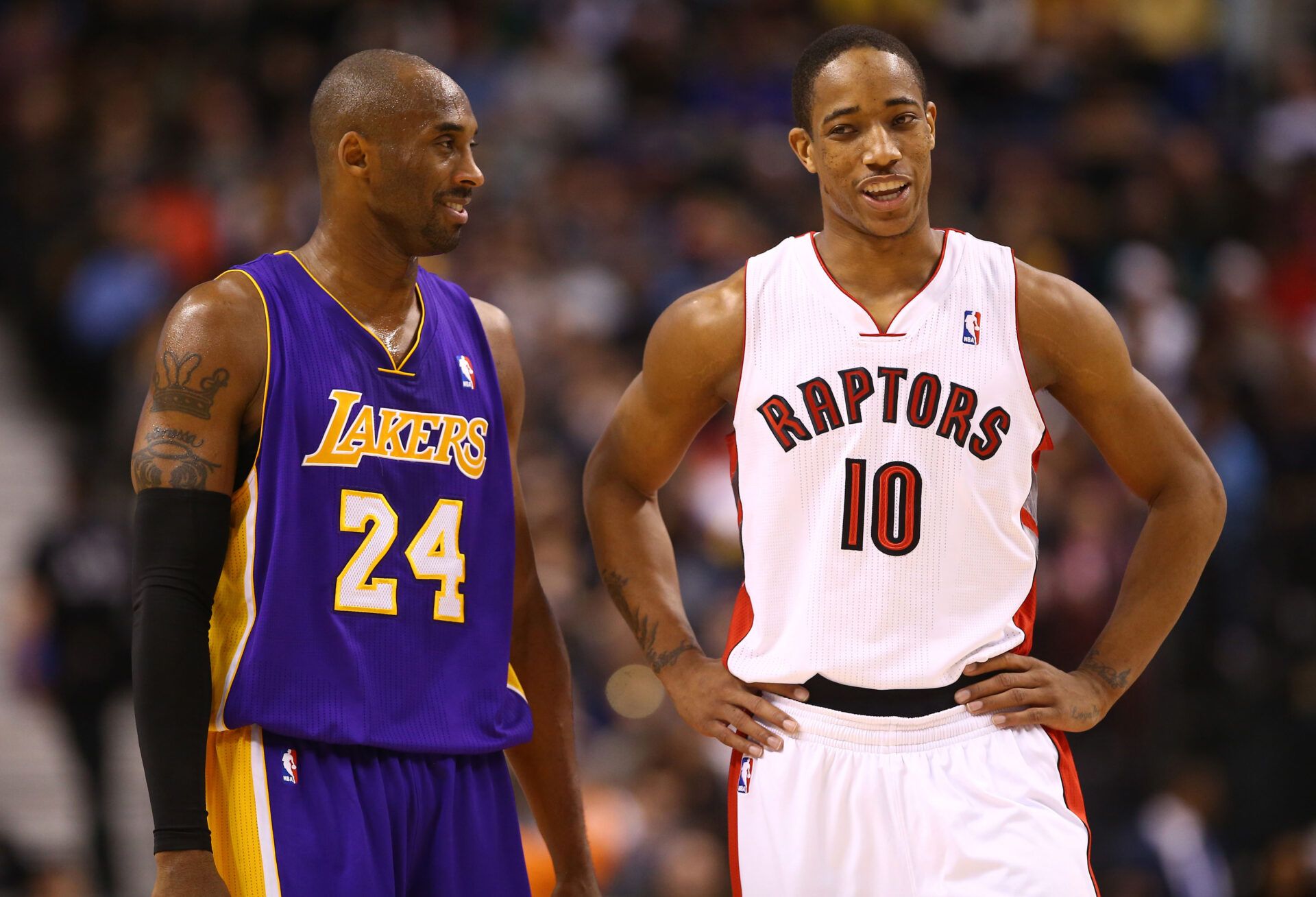 Los Angeles Lakers guard Kobe Bryant (24) talks to Toronto Raptors forward DeMar DeRozan (10) at the Air Canada Centre. The Raptors beat the Lakers 108-103.