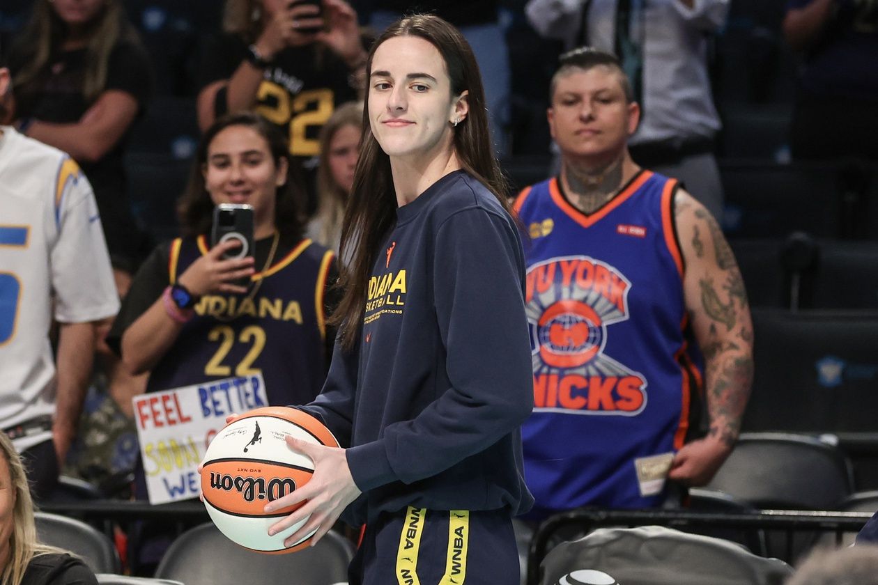 Indiana Fever guard Caitlin Clark (22) walks onto the court prior to the game against the New York Liberty at Barclays Center.