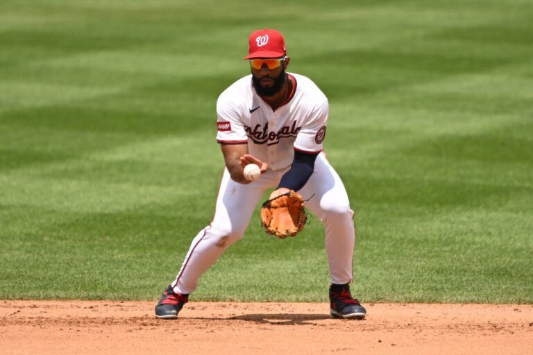 Washington Nationals third baseman Amed Rosario (13) catches a line drive for an out against the Detroit Tigers during the fourth inning at Nationals Park.