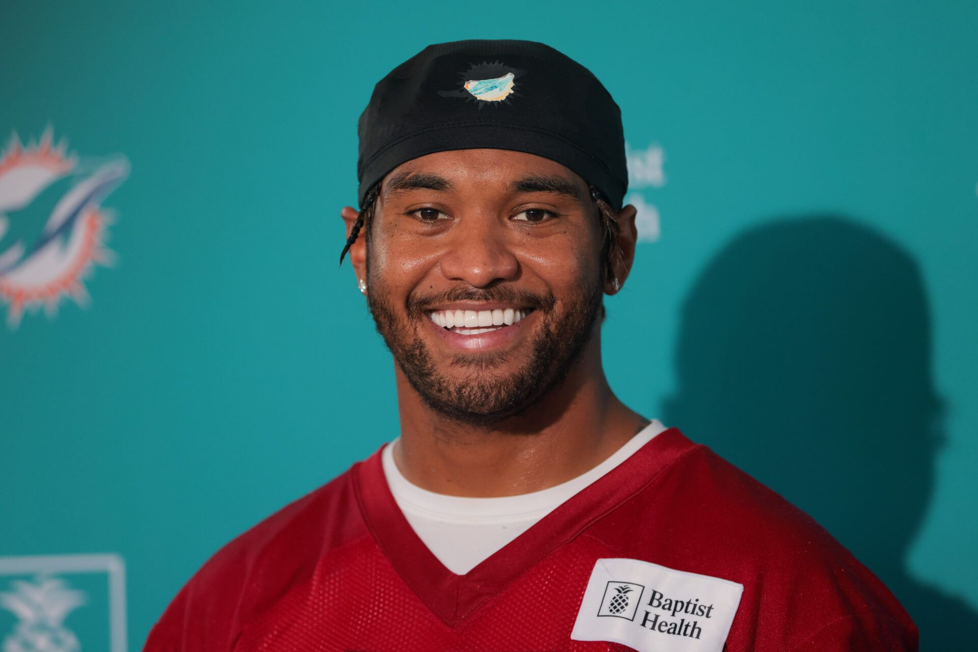 Miami Dolphins quarterback Tua Tagovailoa (1) speaks to reporters during training camp at Baptist Health Training Complex.