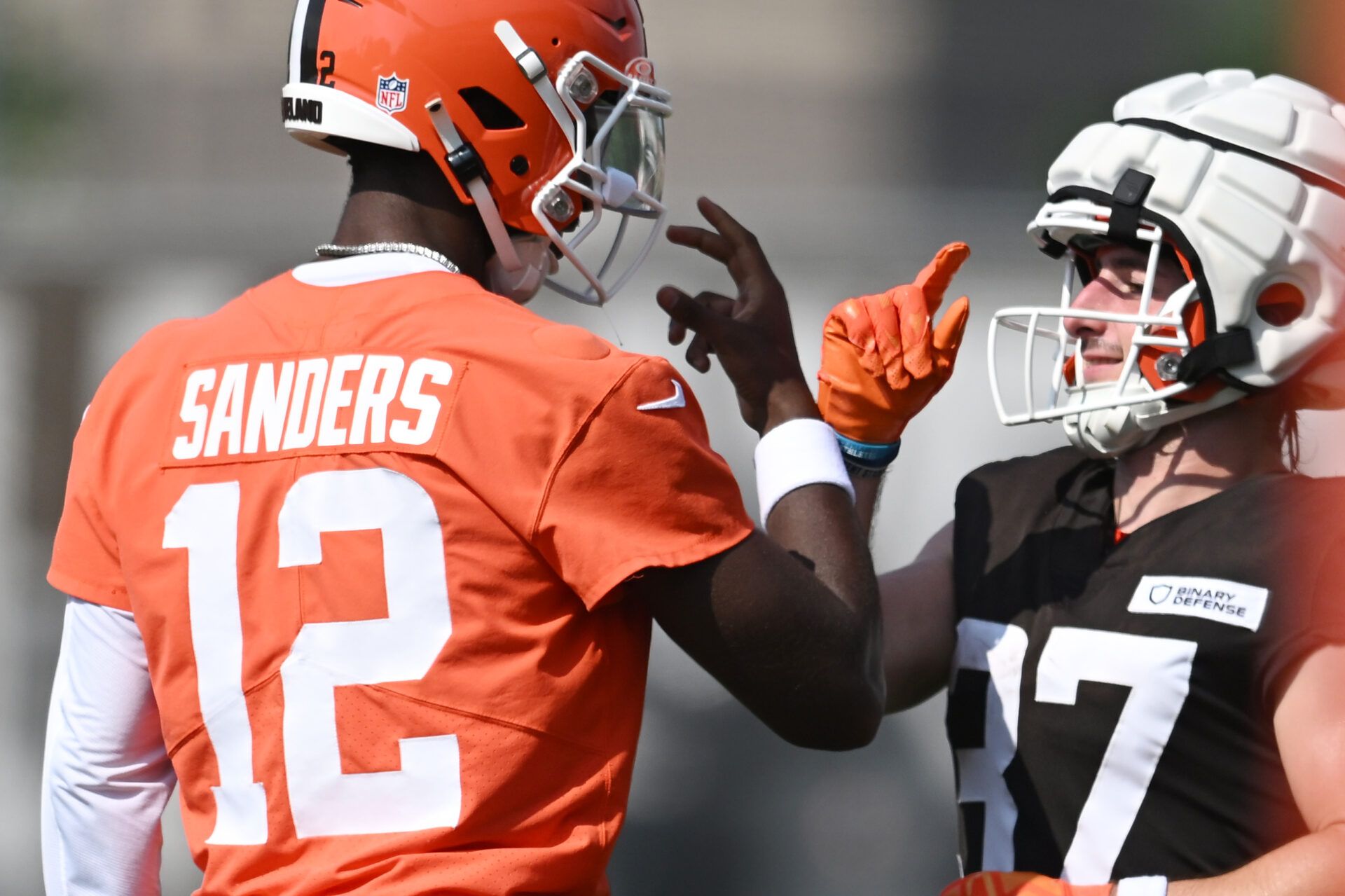 Cleveland Browns quarterback Shedeur Sanders (12) celebrates with wide receiver Luke Floriea (37) during training camp at CrossCountry Mortgage Campus.