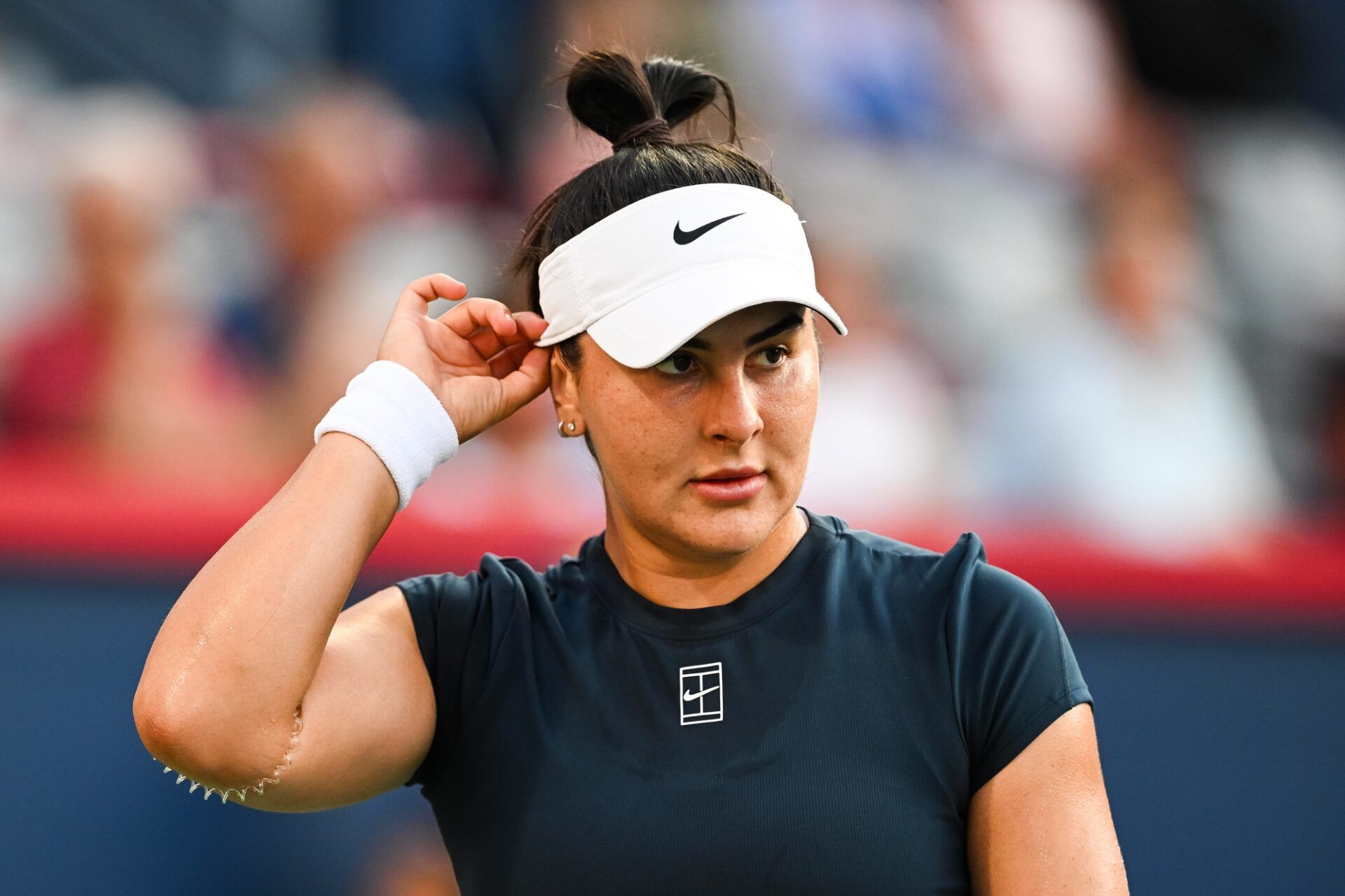 Bianca Andreescu (CAN) looks on against Barbora Krejcikova (CZE) in first round play at IGA Stadium.