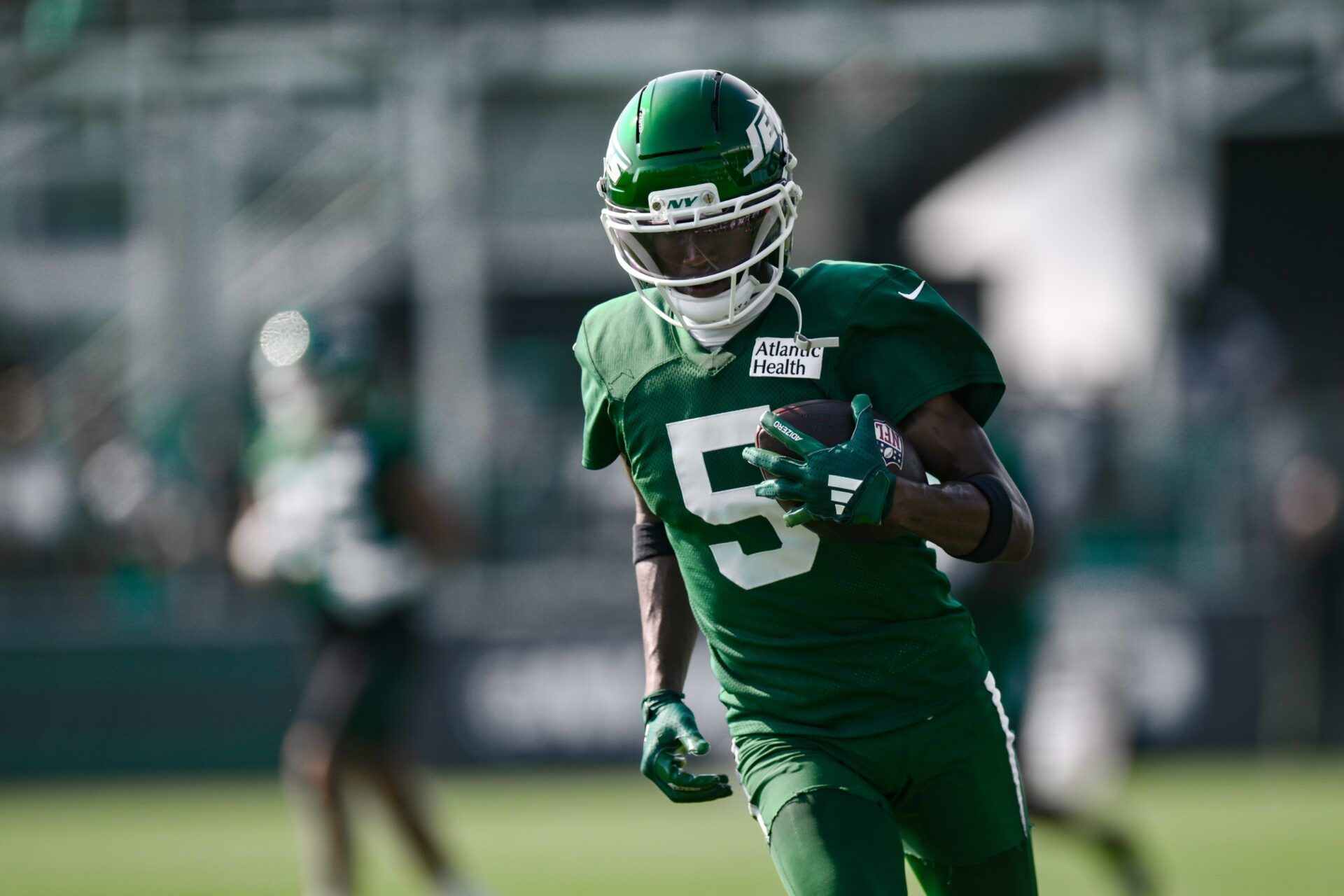 New York Jets wide receiver Garrett Wilson (5) participates in a drill during training camp at Atlantic Health Jets Training Center.