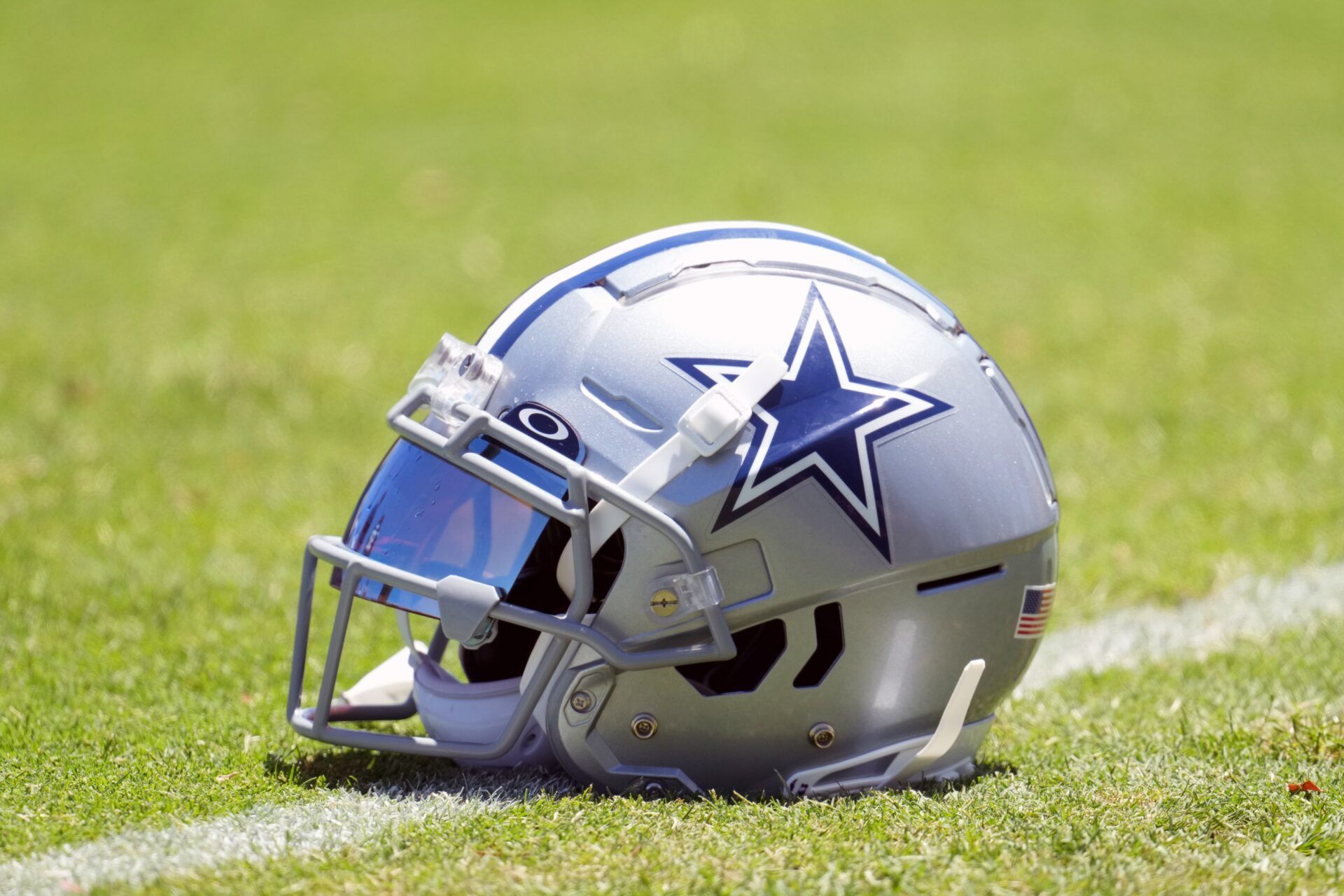 A Dallas Cowboys helmet with Oakley visor at training camp at Marriott Residence Inn-River Ridge Playing Fields.