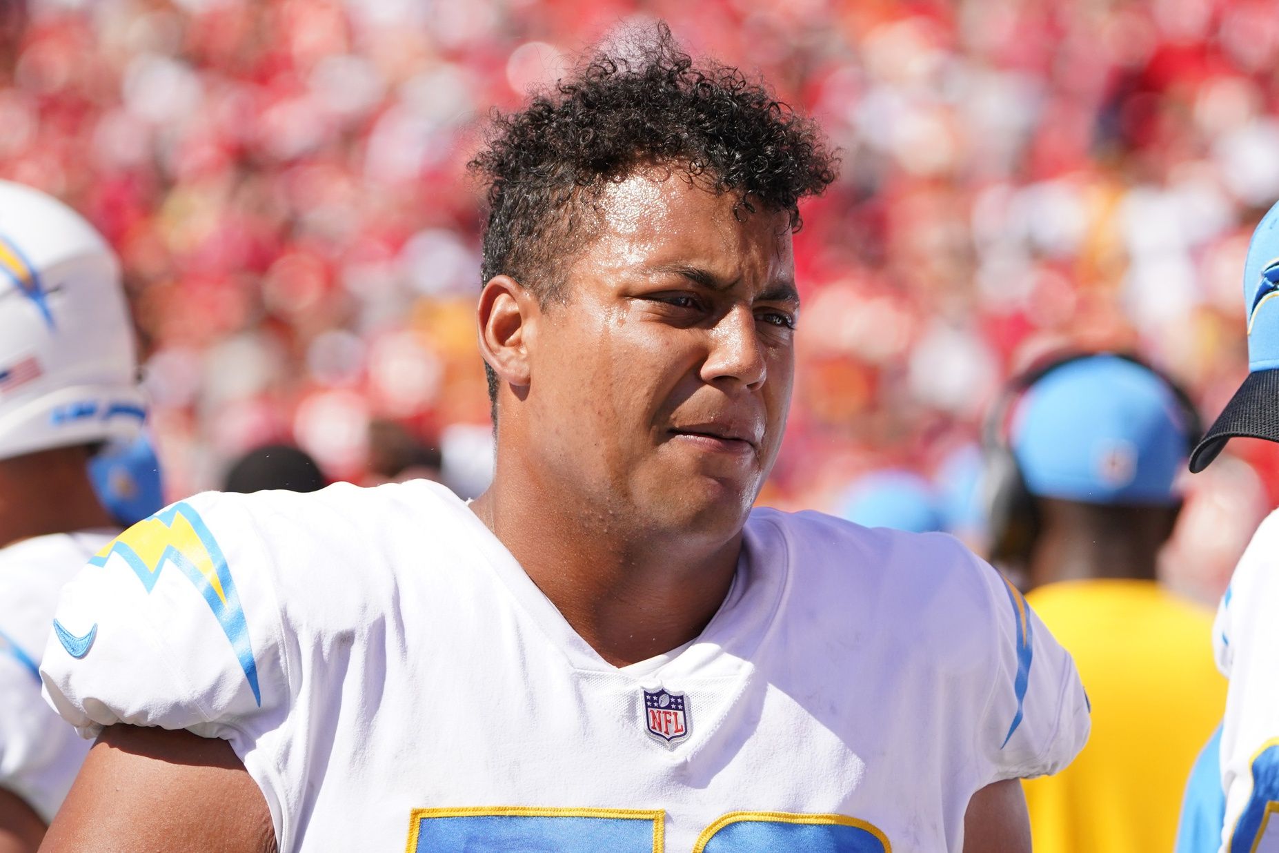 Los Angeles Chargers offensive tackle Rashawn Slater (70) on the sidelines against the Kansas City Chiefs during the game at GEHA Field at Arrowhead Stadium.