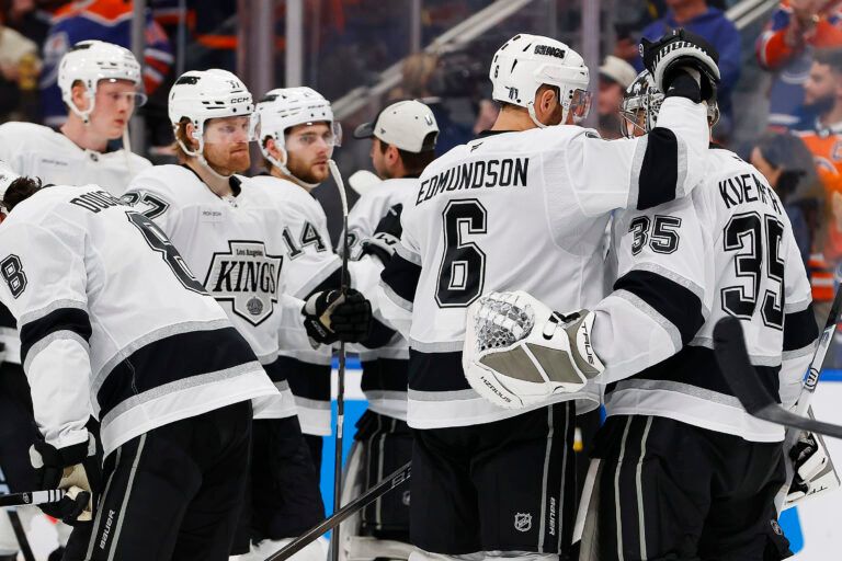 The Los Angeles Kings console Los Angeles Kings goaltender Darcy Kuemper (35) after the Edmonton Oilers eliminated them  in game six of the first round of the 2025 Stanley Cup Playoffs at Rogers Place.