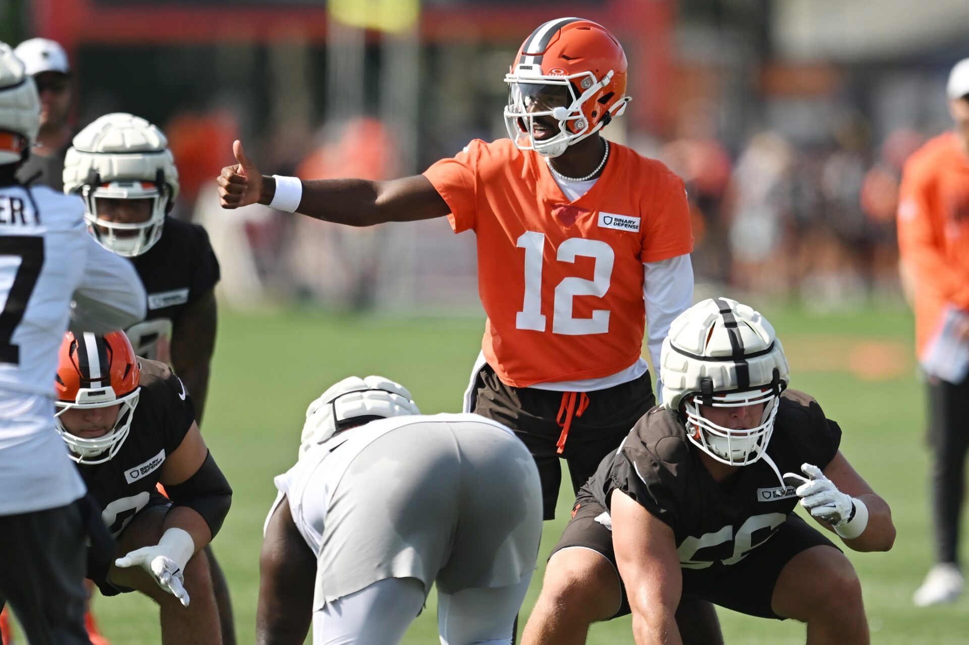 Cleveland Browns quarterback Shedeur Sanders (12) runs the offense during training camp at CrossCountry Mortgage Campus.