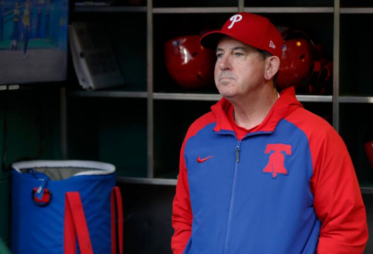 Philadelphia Phillies manager Rob Thomson (59) looks on from the dugout against the Pittsburgh Pirates at PNC Park.