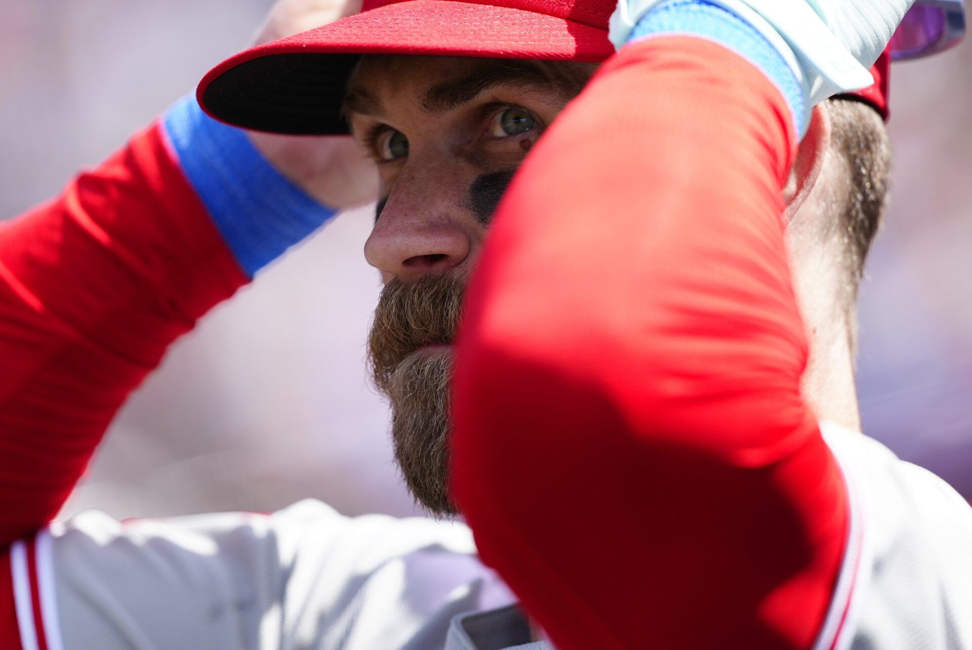 Philadelphia Phillies first base Bryce Harper (3) prepares to take to the field in the seventh inning against the Colorado Rockies at Coors Field.