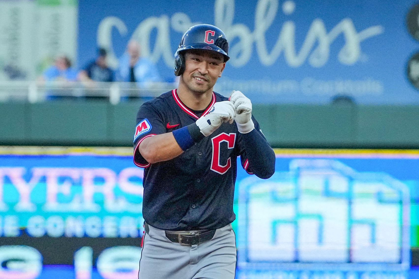 Cleveland Guardians left fielder Steven Kwan (38) celebrates while running the bases after hitting a two run home run against the Kansas City Royals in the fourth inning at Kauffman Stadium.