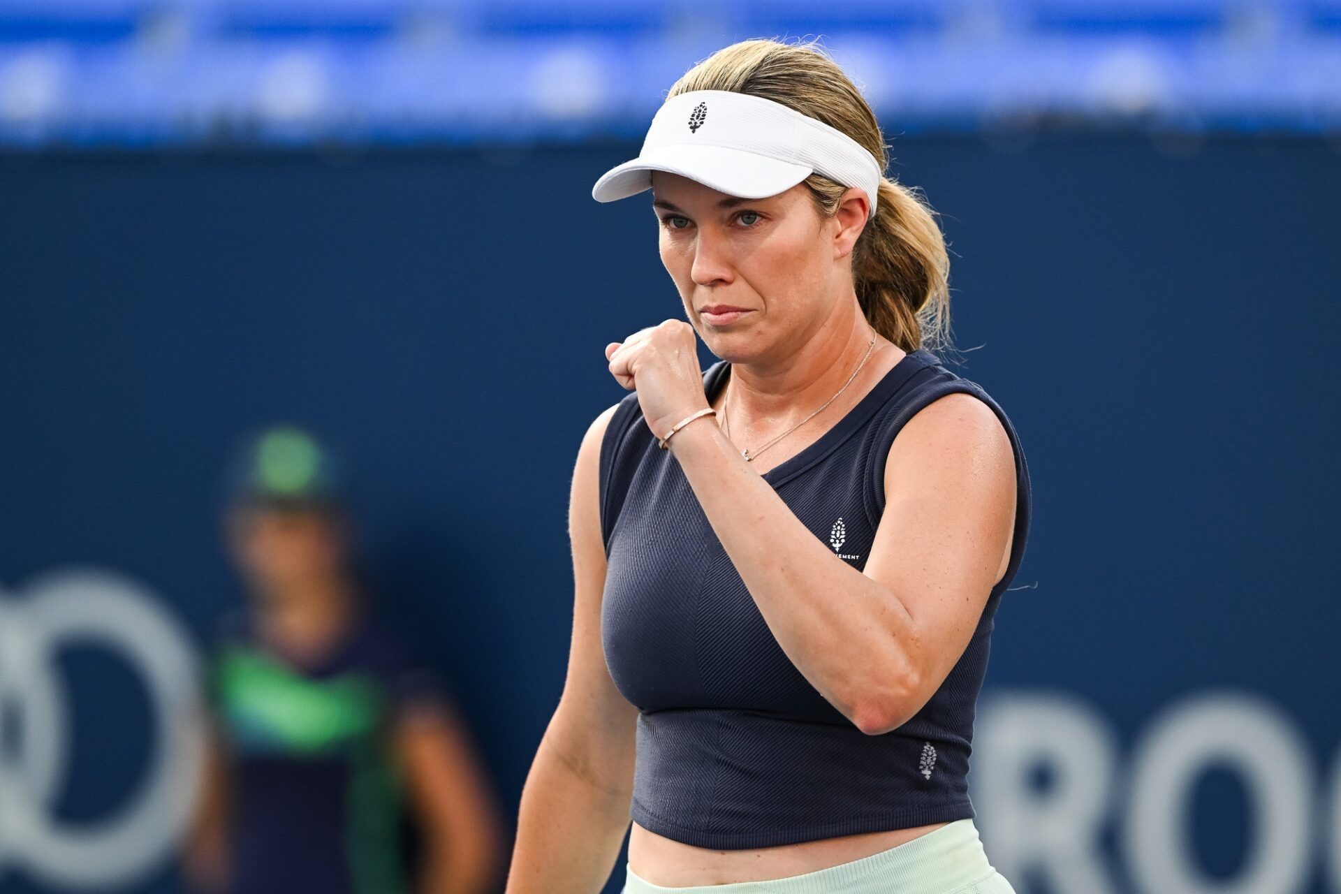 Danielle Collins (USA) reacts after scoring a point against Viktoriya Tomova (BUL) in first round play at IGA Stadium.