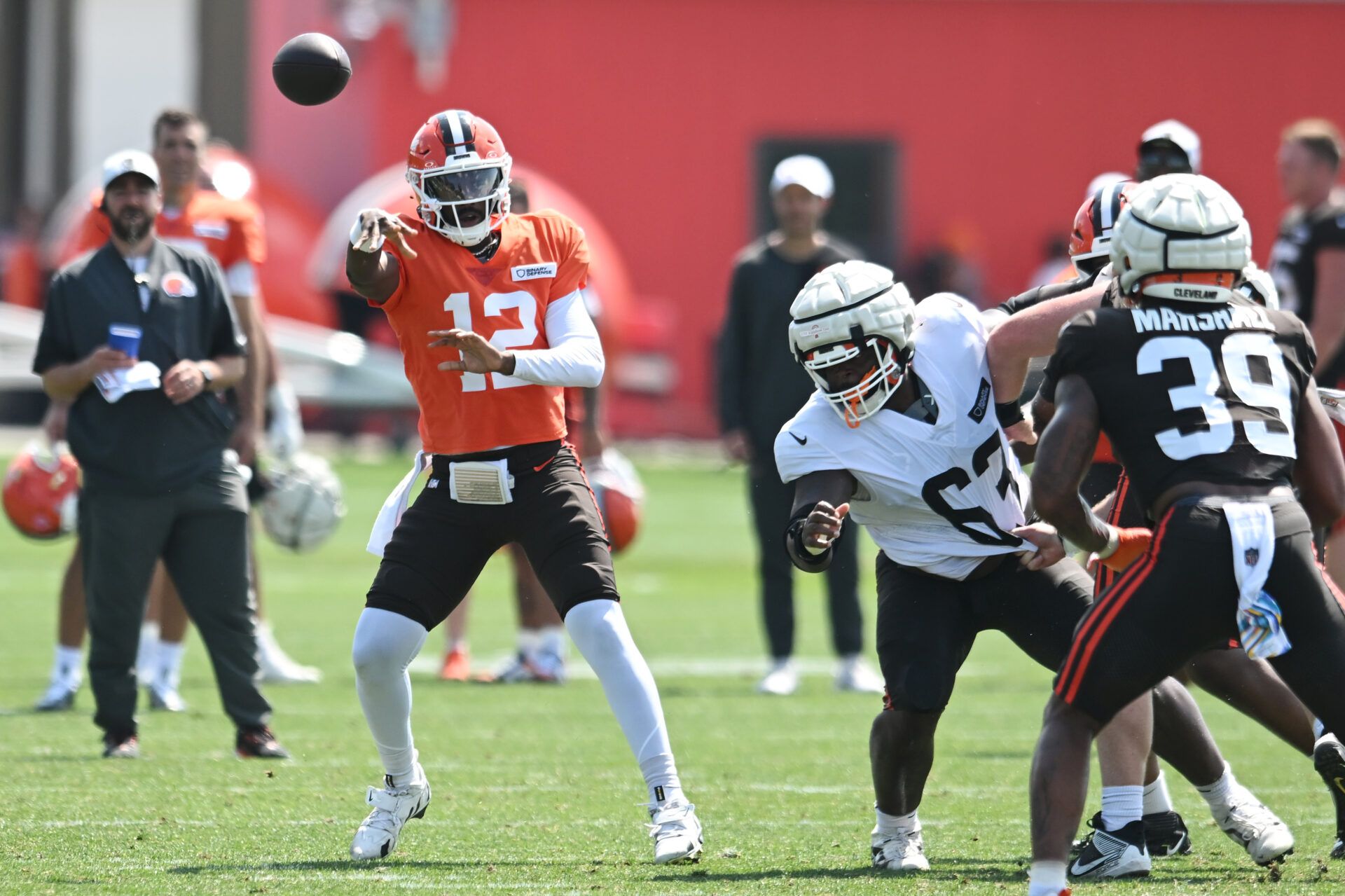 Cleveland Browns quarterback Shedeur Sanders (12) throws a pass during training camp at CrossCountry Mortgage Campus.