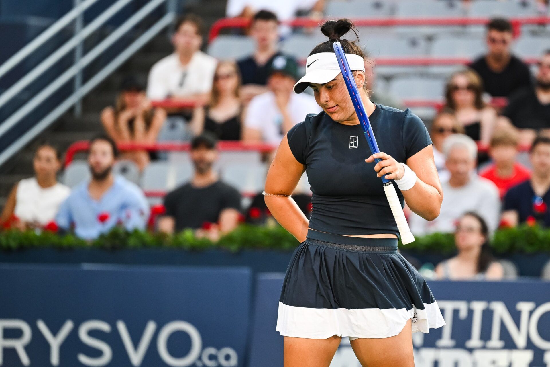 Bianca Andreescu (CAN) reacts after losing a point against Barbora Krejcikova (CZE) in first round play at IGA Stadium.