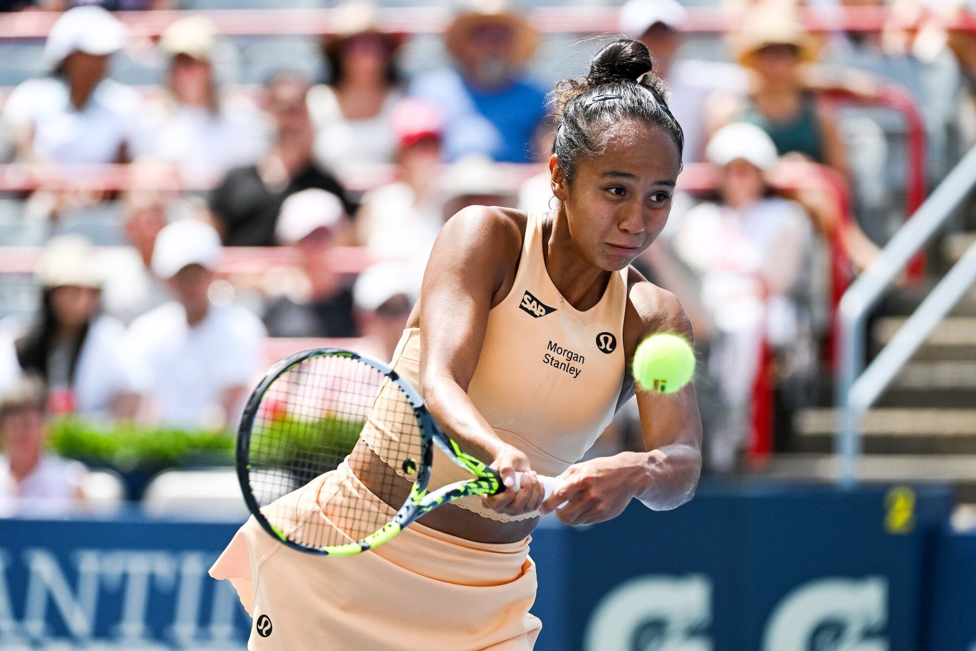 Leylah Fernandez (CAN) returns the ball to Maya Joint (AUS) in first round play at IGA Stadium.
