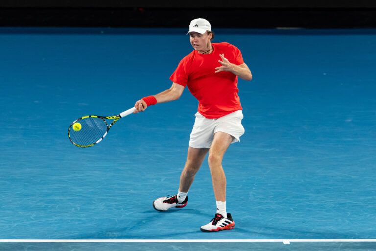 Alex Michelsen of United States of America hits a forehand during his match against Alex de Minaur of Australia in the fourth round of the men's singles at the 2025 Australian Open at Melbourne Park.