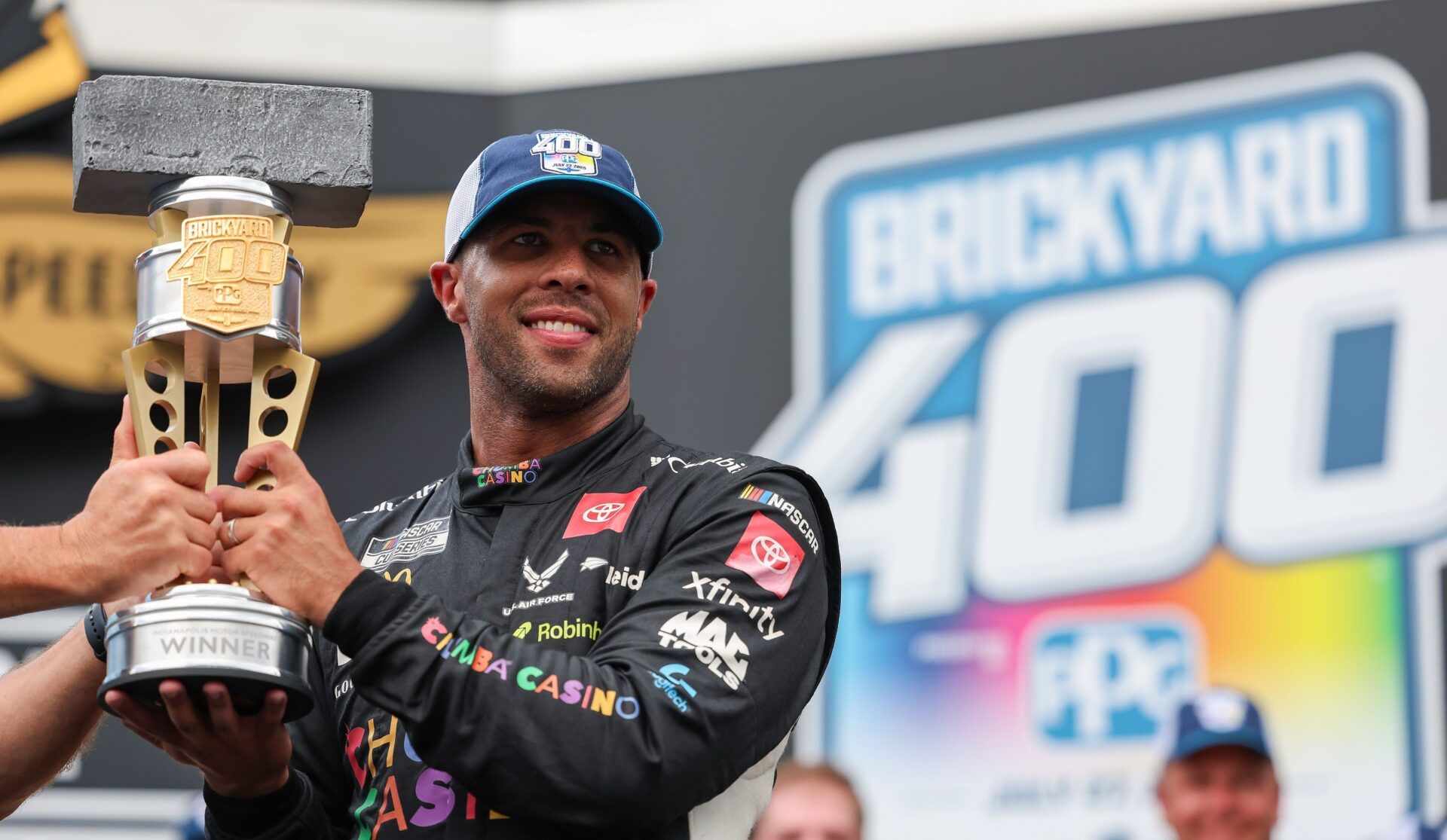 NASCAR Cup Series driver Bubba Wallace (23) celebrates winning Sunday, July 27, 2025, the Brickyard 400 at Indianapolis Motor Speedway.