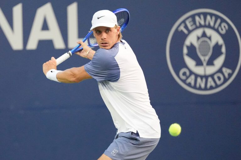 Denis Shapovalov (CAN) sets up to return a ball to Learner Tien (not pictured) during the second round at Sobeys Stadium.