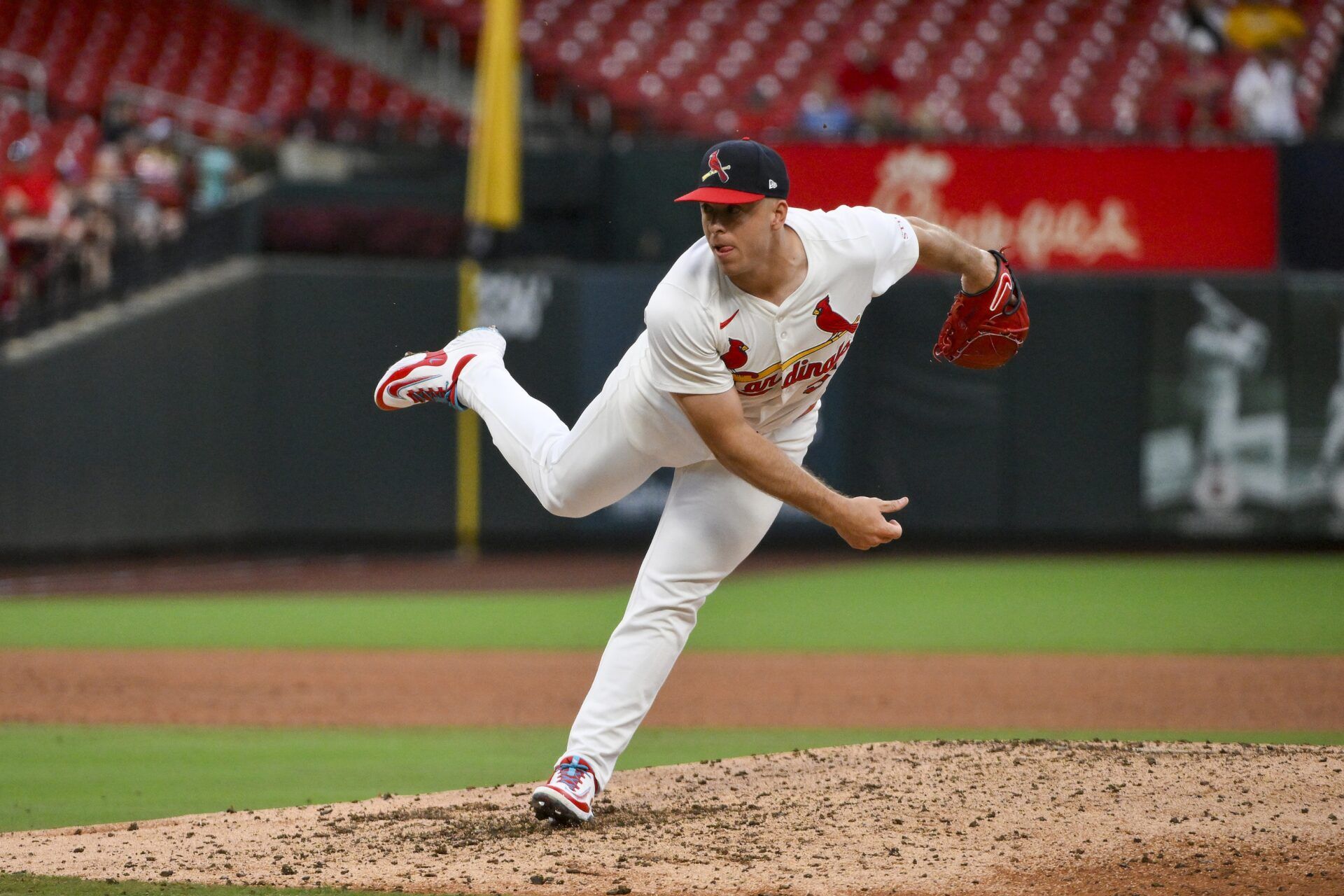 St. Louis Cardinals relief pitcher Ryan Helsley (56) pitches against the Atlanta Braves during the ninth inning at Busch Stadium.