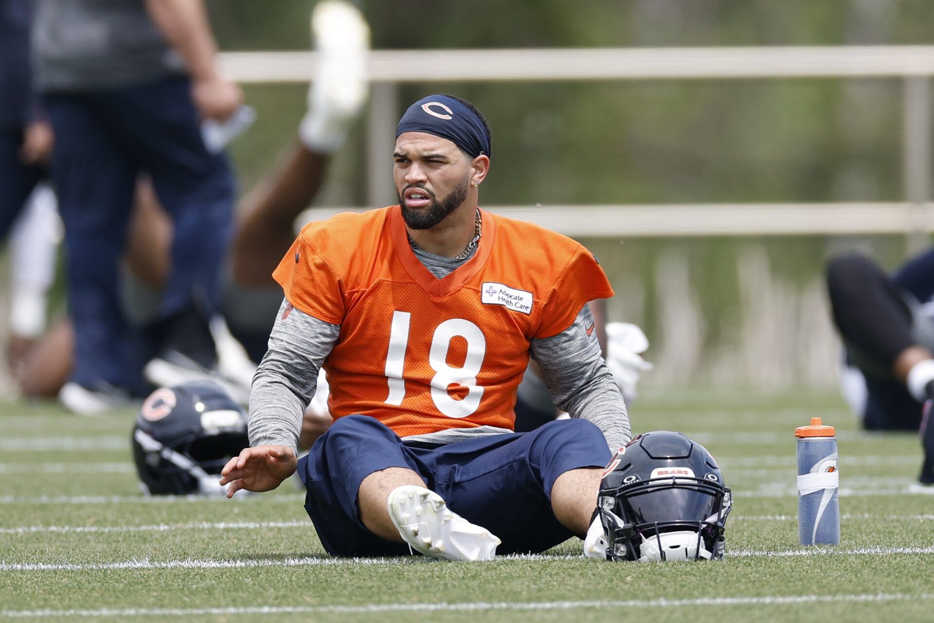 Chicago Bears quarterback Caleb Williams (18) warms up during minicamp at Halas Hall.