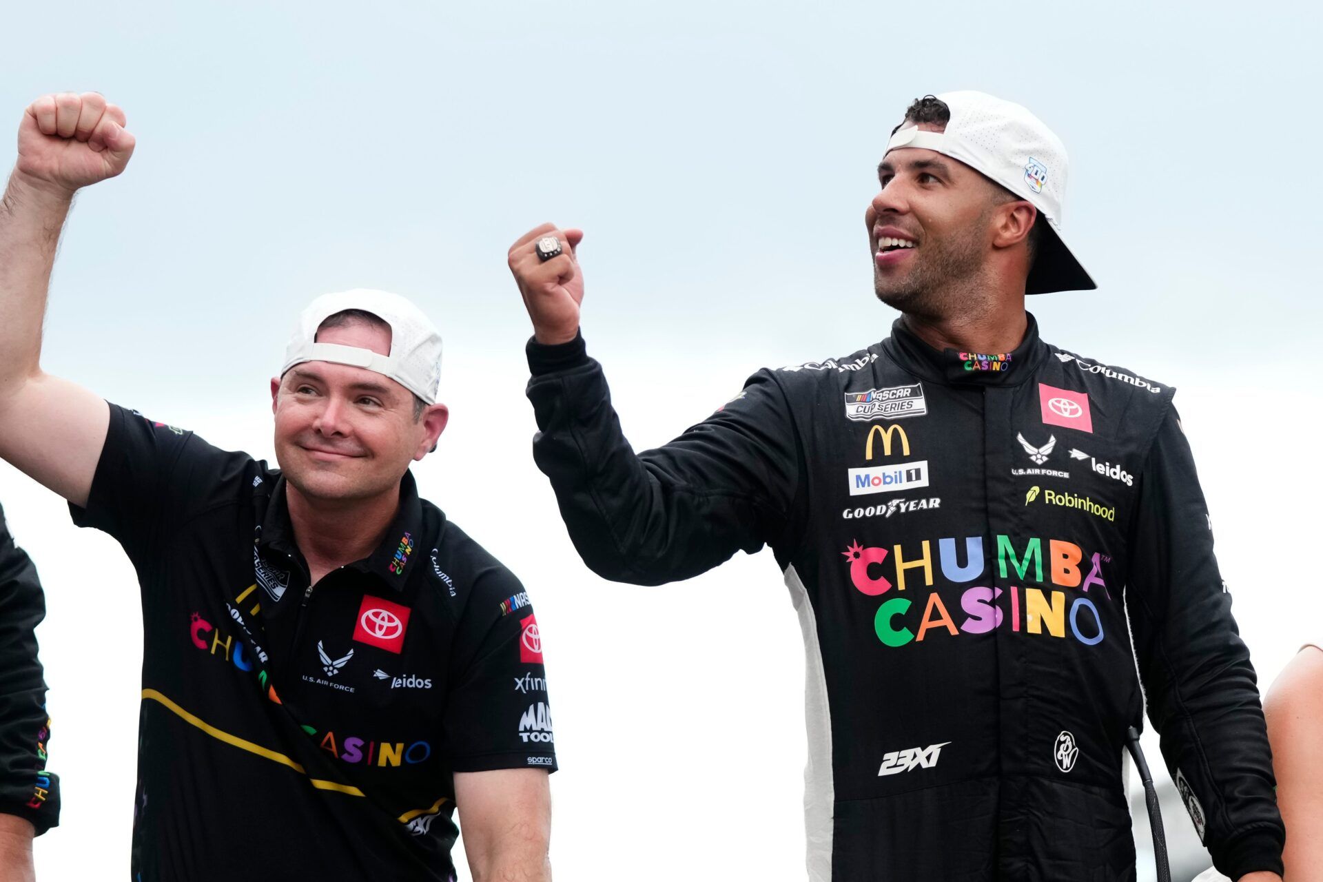 NASCAR Cup Series driver Bubba Wallace (23) celebrates on the yard of bricks Sunday, July 27, 2025, during the Brickyard 400 at Indianapolis Motor Speedway.
