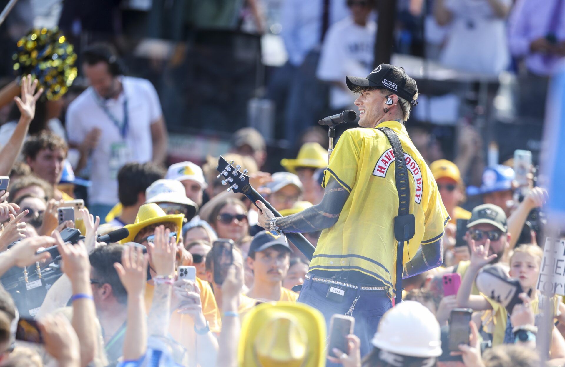 MGK aka Machine Gun Kelly performs during the Fox Big Noon Kickoff prior to the game outside of Mountaineer Field at Milan Puskar Stadium.