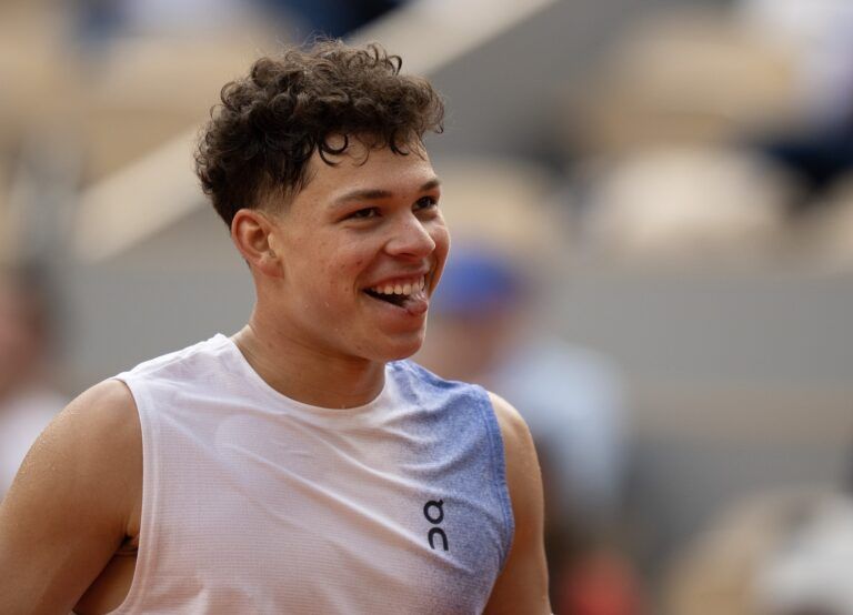 Ben Shelton of the United States reacts to a point during his match against Carlos Alcaraz of Spain on day eight at Roland Garros Stadium.