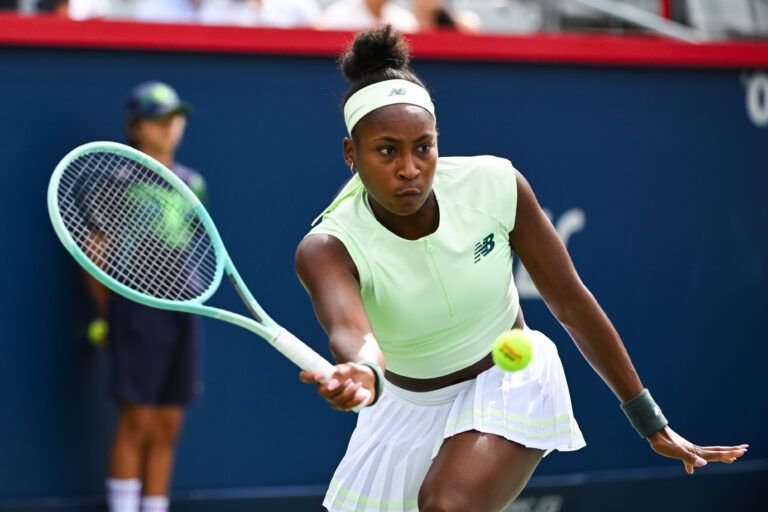 Coco Gauff (USA) returns the ball to Veronika Kudermetova in third round play at IGA Stadium.