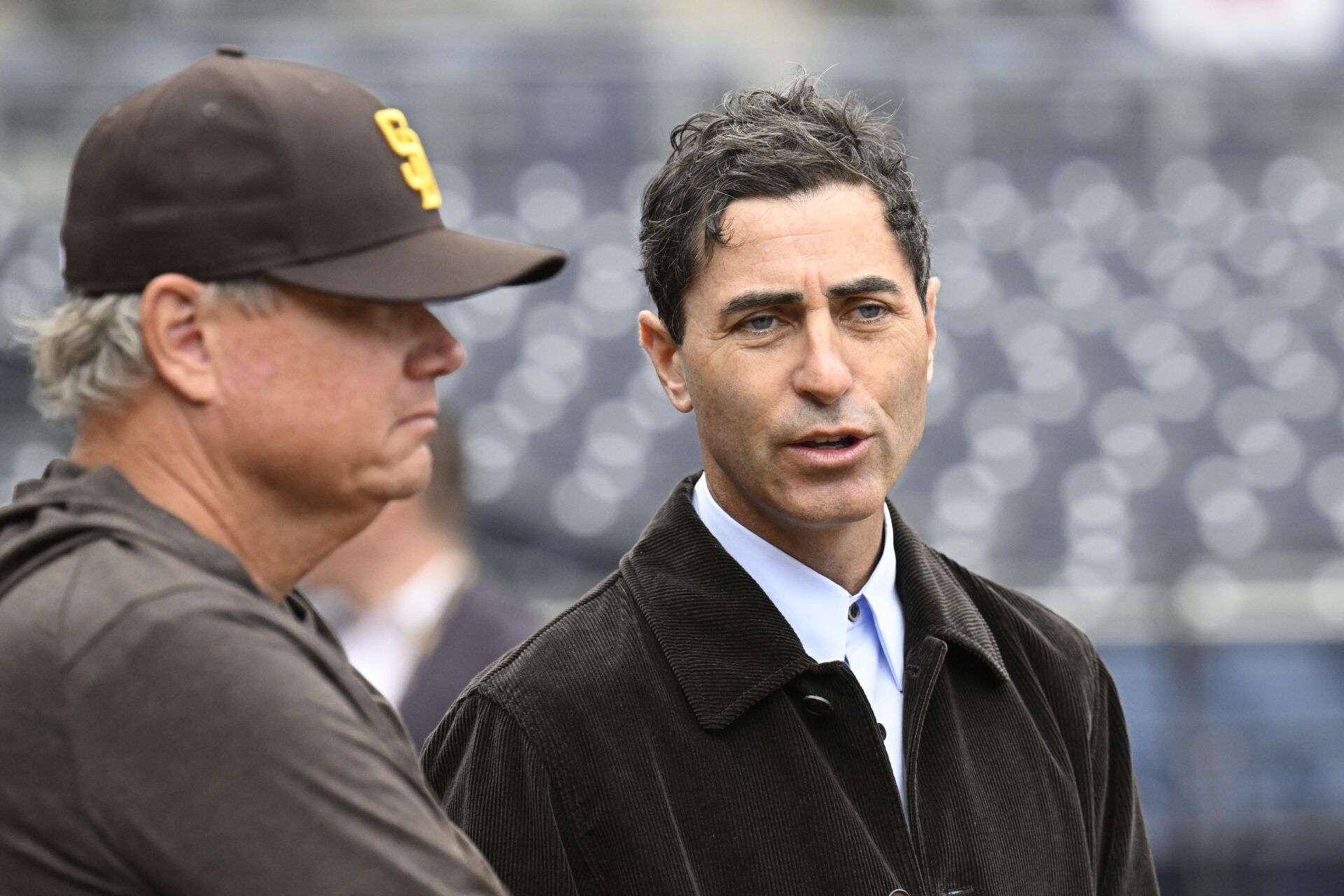 San Diego Padres general manager A.J. Preller, right, talks with manager Mike Shildt before an Opening Day baseball game between the San Diego Padres and the Atlanta Braves at Petco Park.