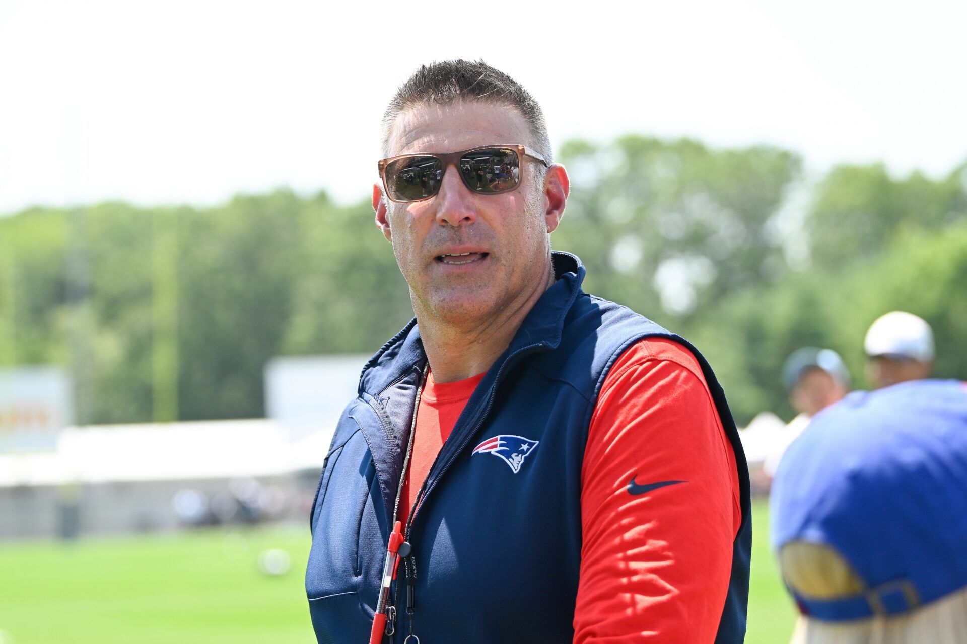 New England Patriots head coach Mike Vrabel leaves the practice fields after training camp at Gillette Stadium.