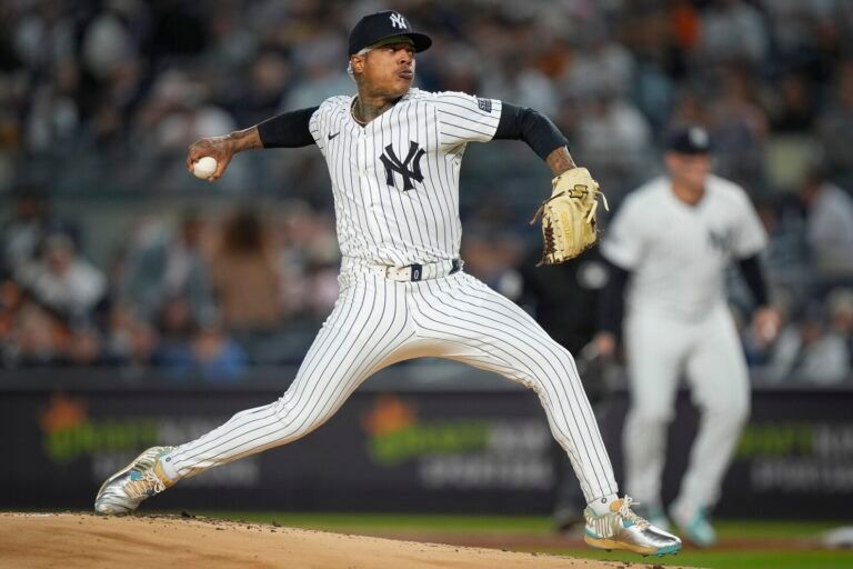 FILE - New York Yankees pitcher Marcus Stroman delivers during the first inning of a baseball game against the Baltimore Orioles, Sept. 25, 2024, in New York. (AP Photo/Bryan Woolston, File)