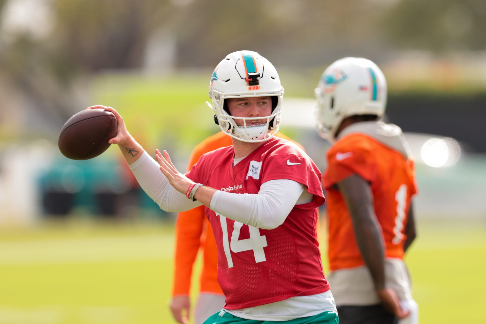 Miami Dolphins quarterback Quinn Ewers (14) throws the football during training camp at Baptist Health Training Complex.