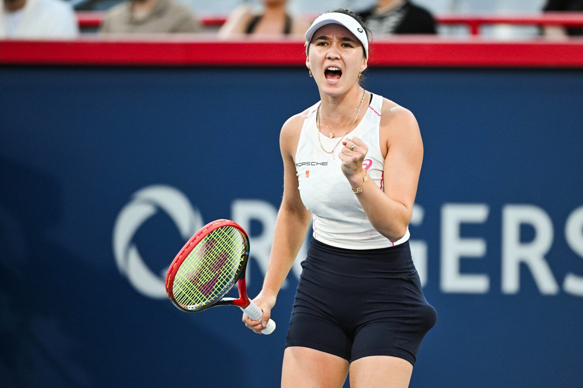 Eva Lys (GER) reacts after winning a point against Iga Swiatek (POL) in third round play at IGA Stadium.