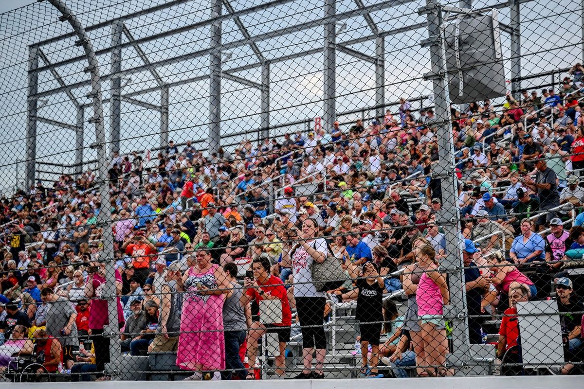 Fans look on from the stands before the 13th annual Masters of the Pros 200 race on Wednesday, July 16, 2025, at the Owosso Speedway. Former NASCAR Cup Series champion Kevin Harvick and his 13-year-old son Keelan competed against each other in the race.